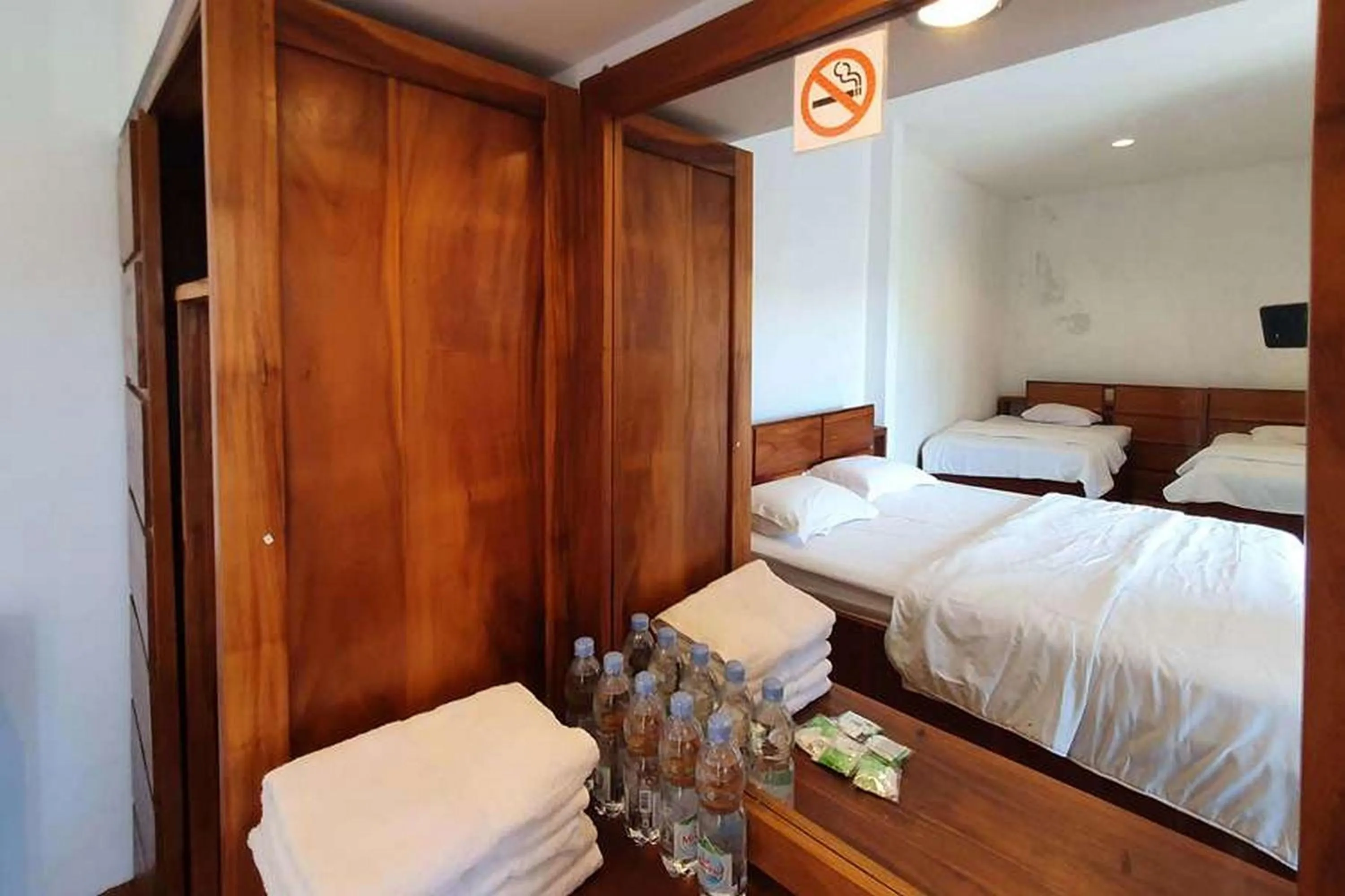 Bed in Rumah Eyang Tardjo Syariah Mitra RedDoorz