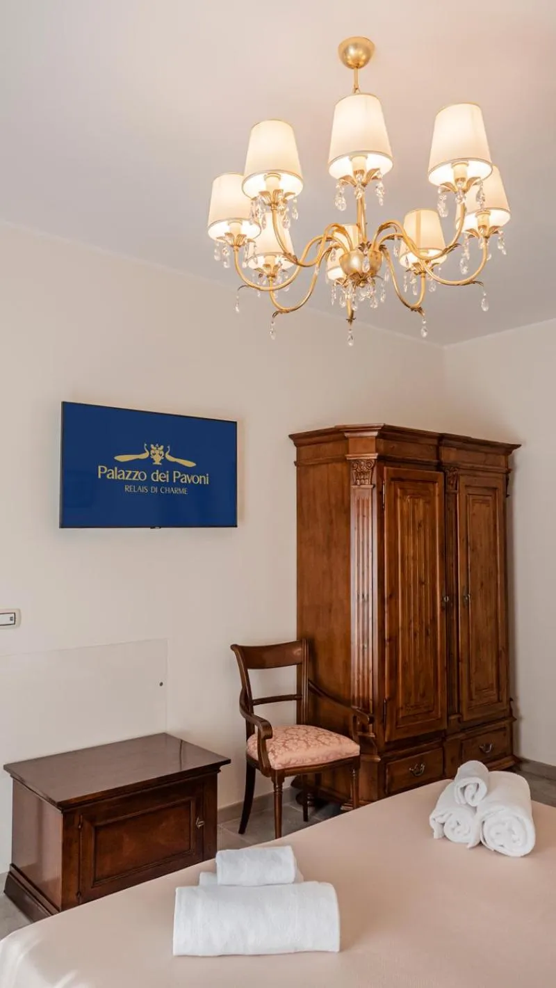Bedroom in Palazzo dei Pavoni, Relais di Charme