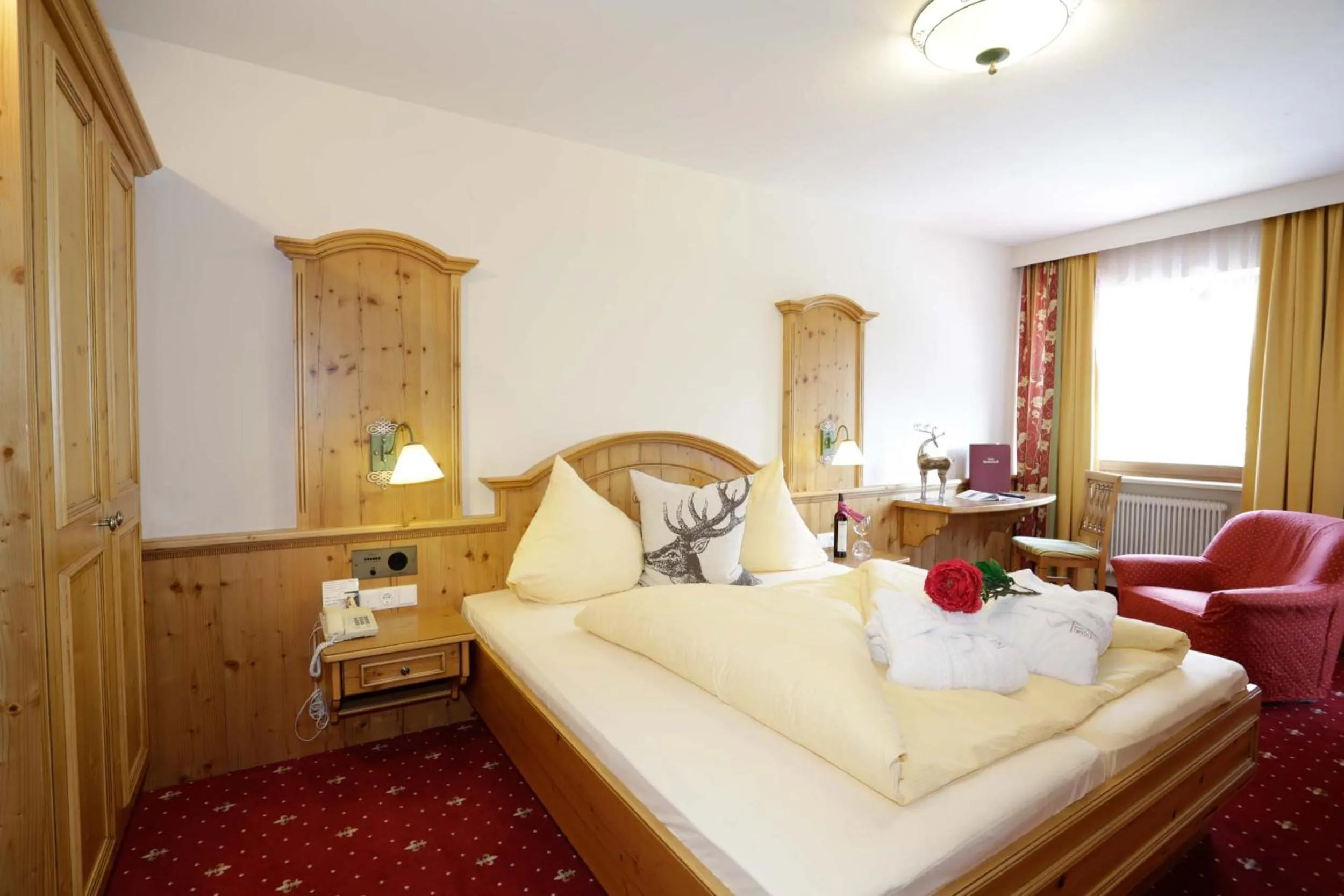 Photo of the whole room, Bed in Sporthotel Tirolerhof