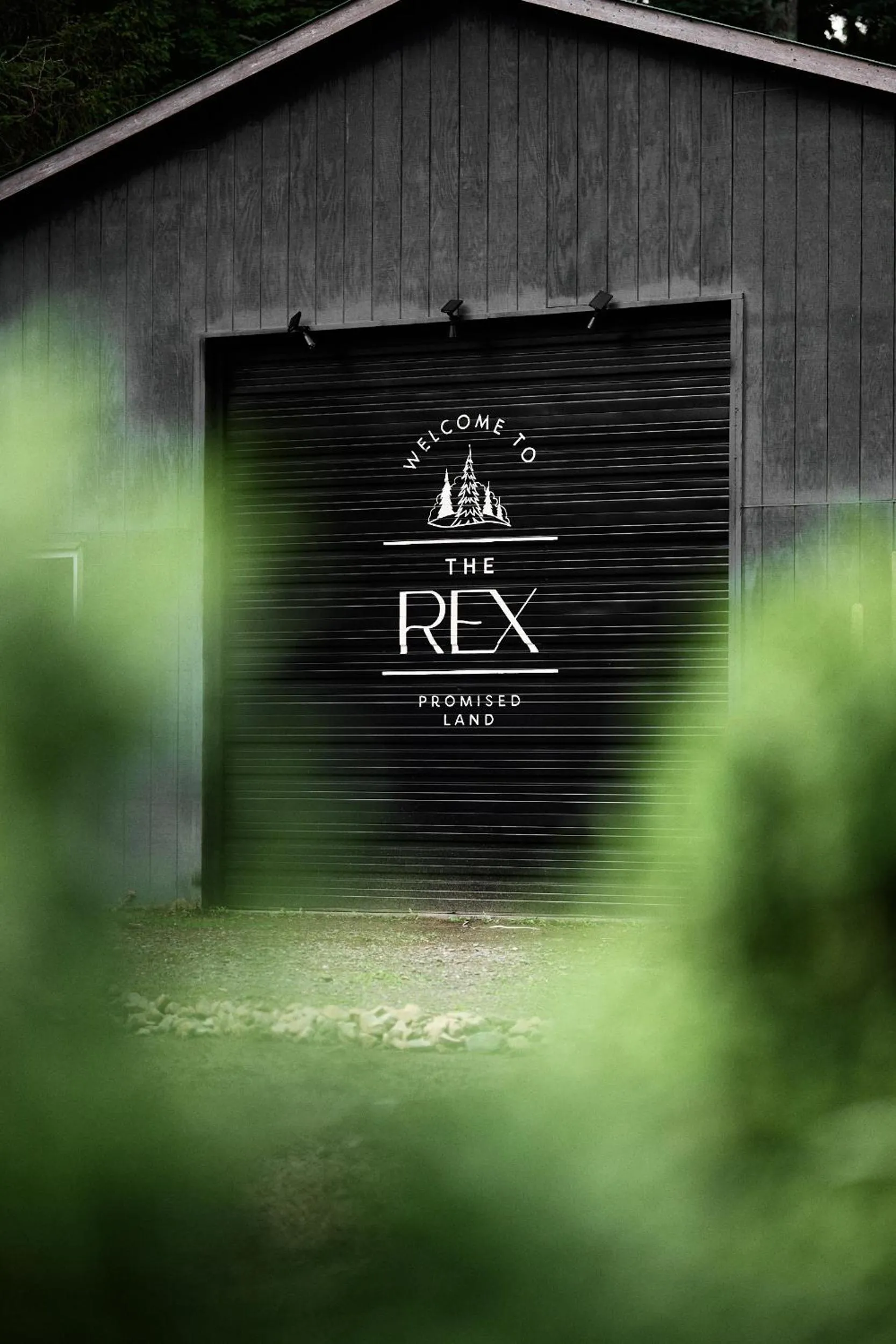 Property logo or sign in The Rex