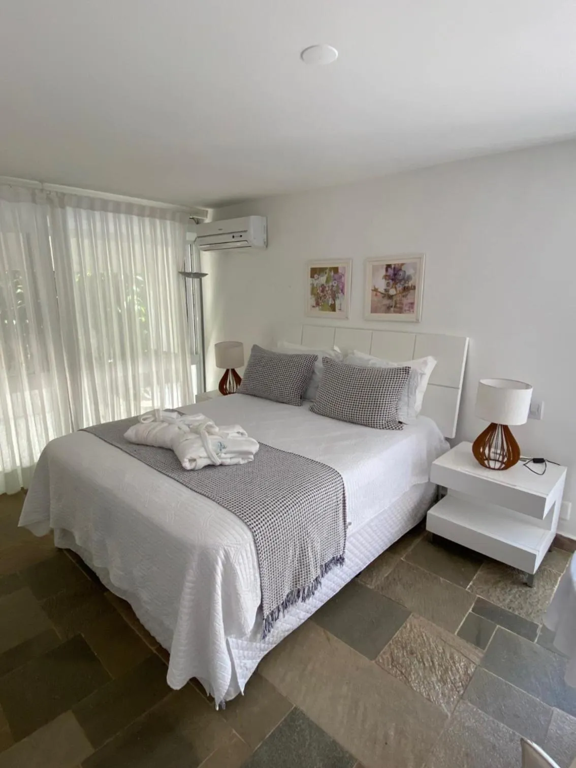 Photo of the whole room in Guest House Guarujá Hotel Boutique