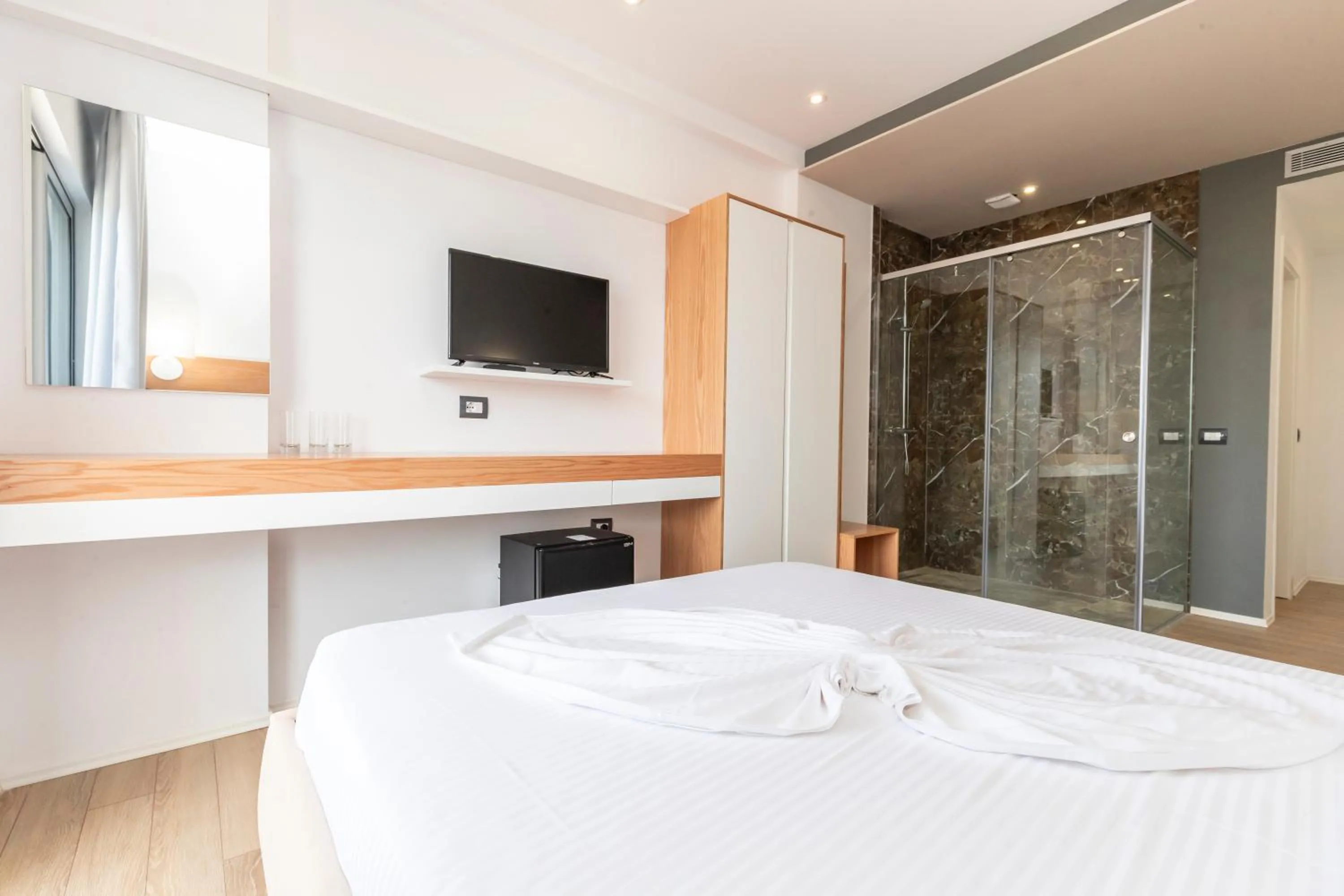Bed in Ventus Hotel