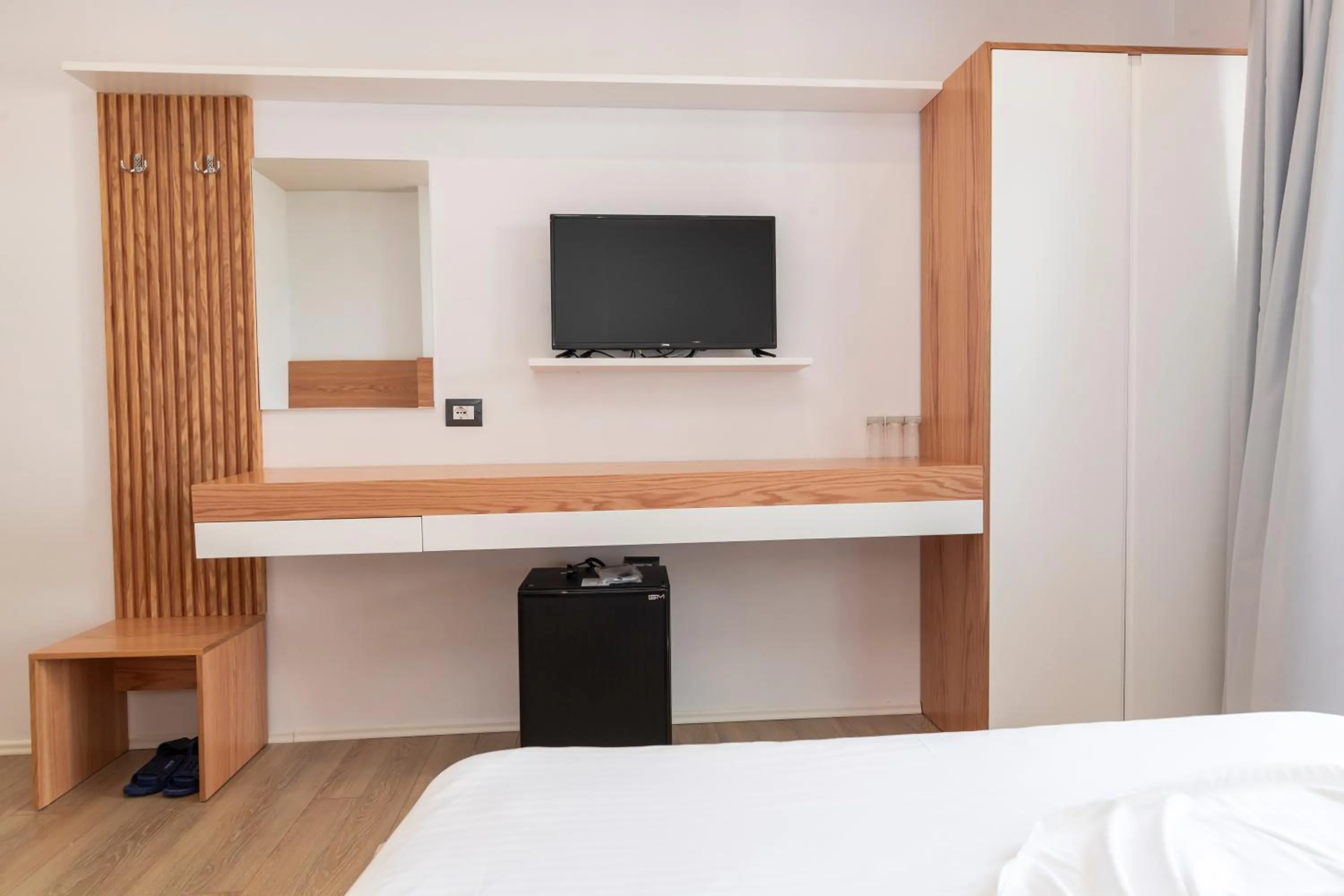 Bed in Ventus Hotel