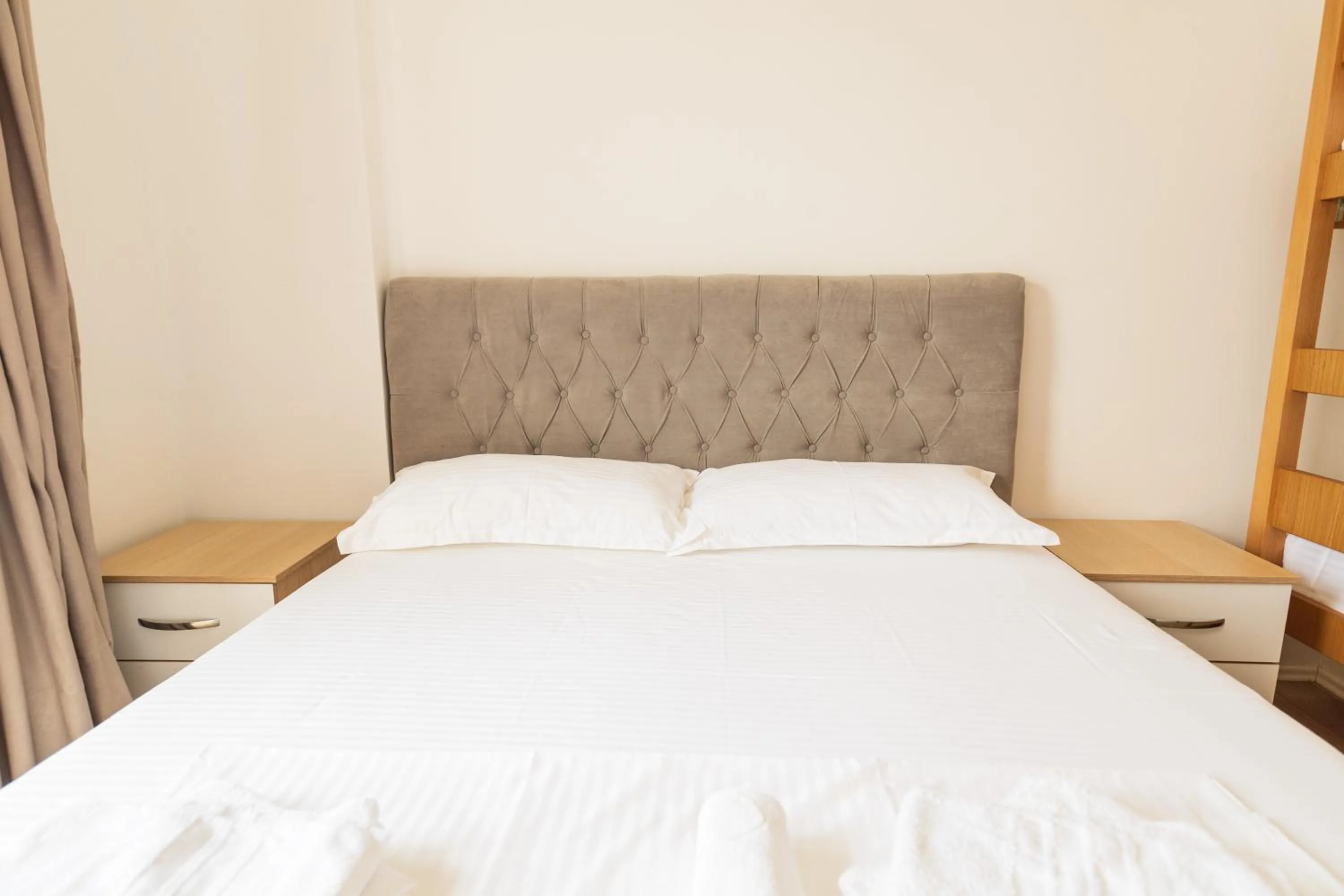 Bed in Ventus Hotel