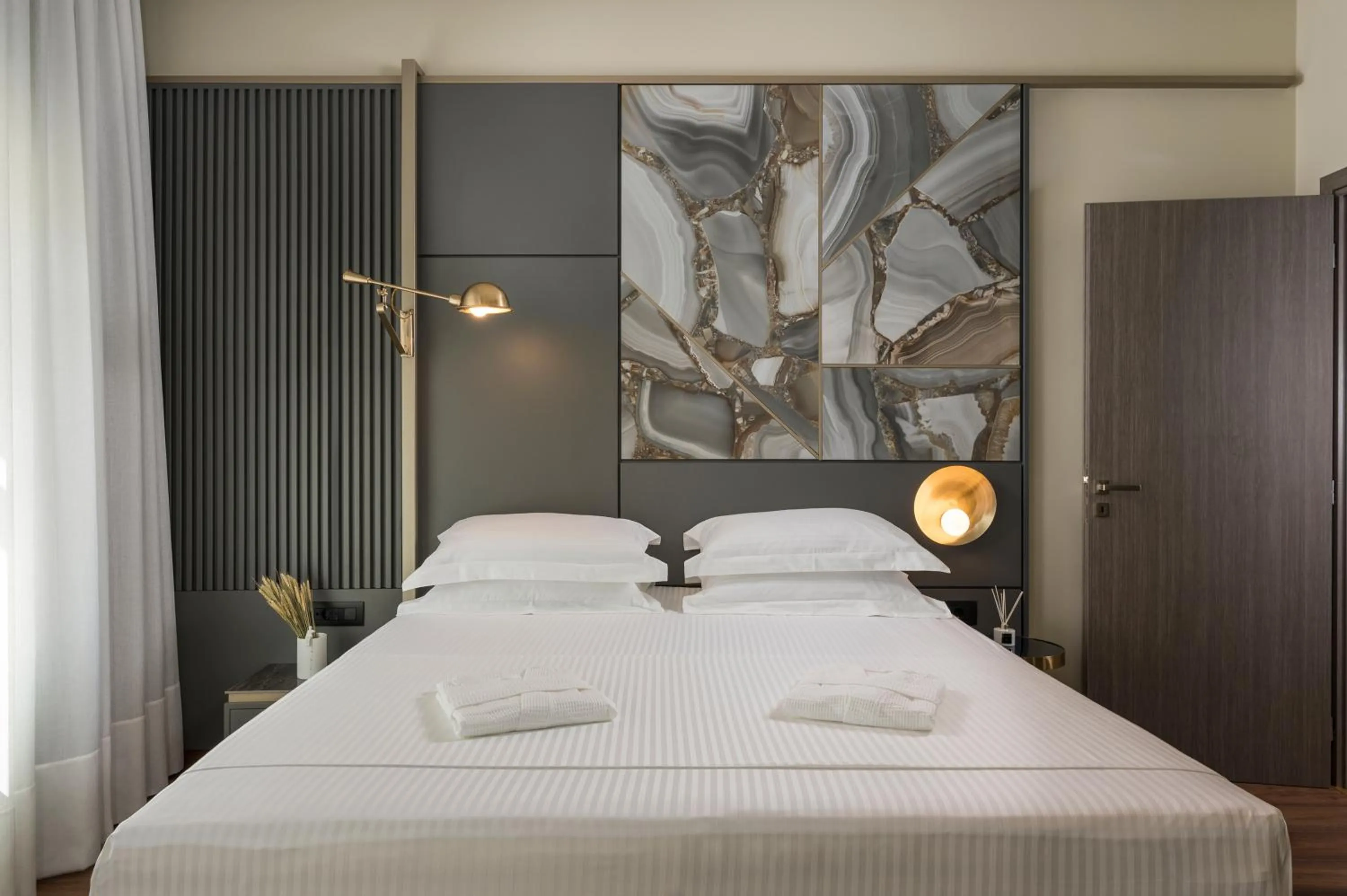 Bed in Veneri Boutique Suites