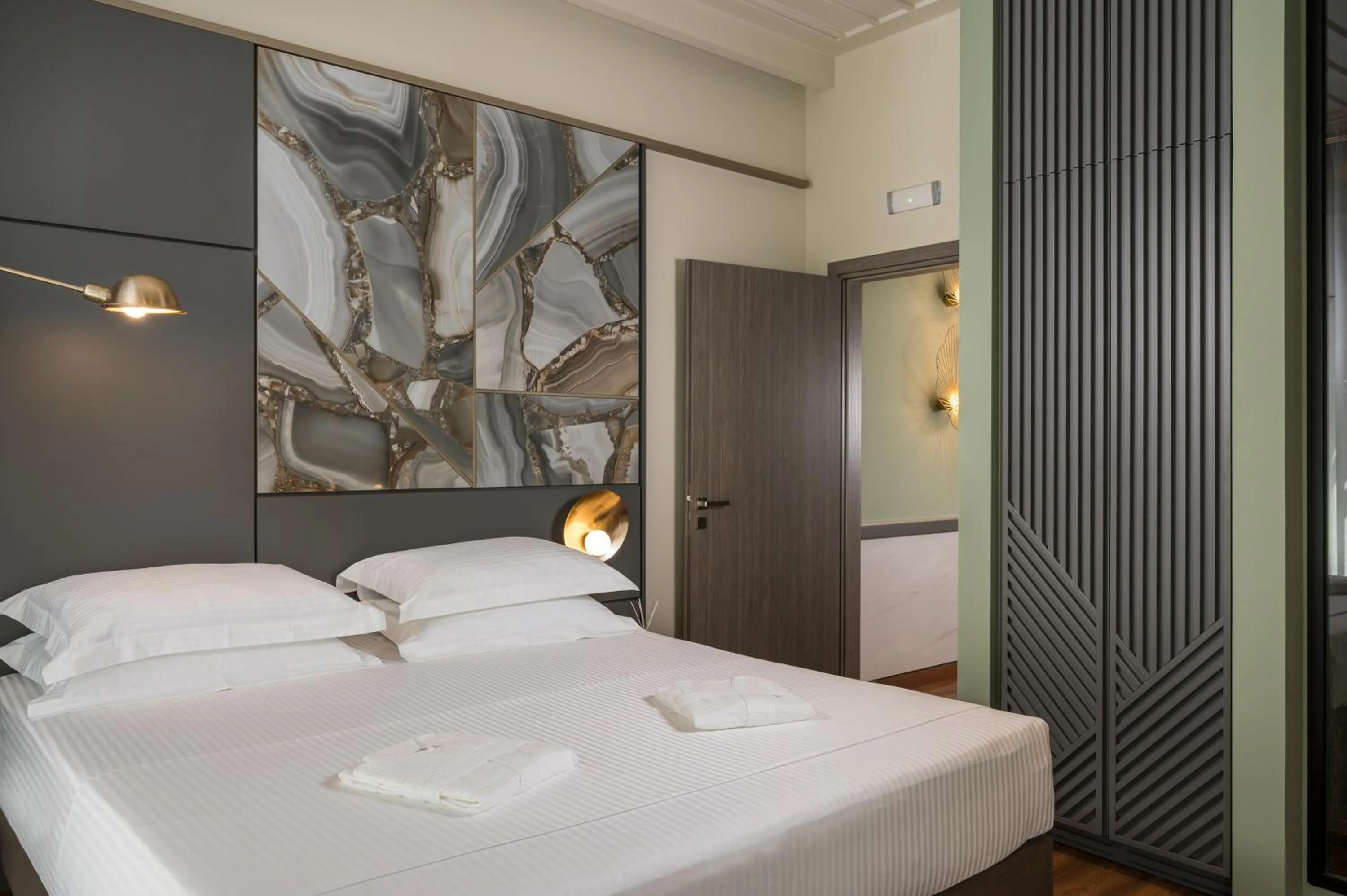 Bed in Veneri Boutique Suites