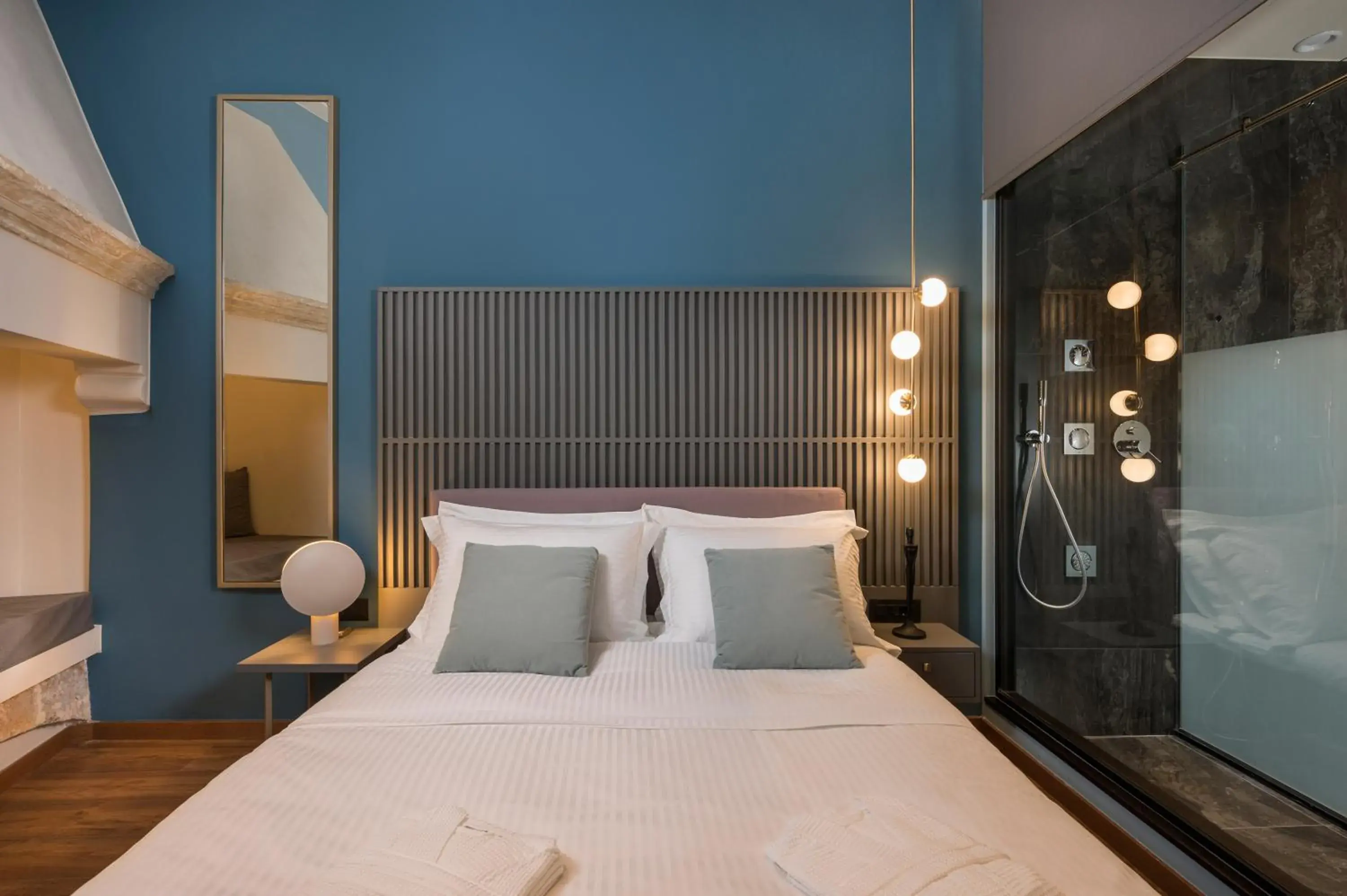 Bed in Veneri Boutique Suites Bed in Veneri Boutique Suites