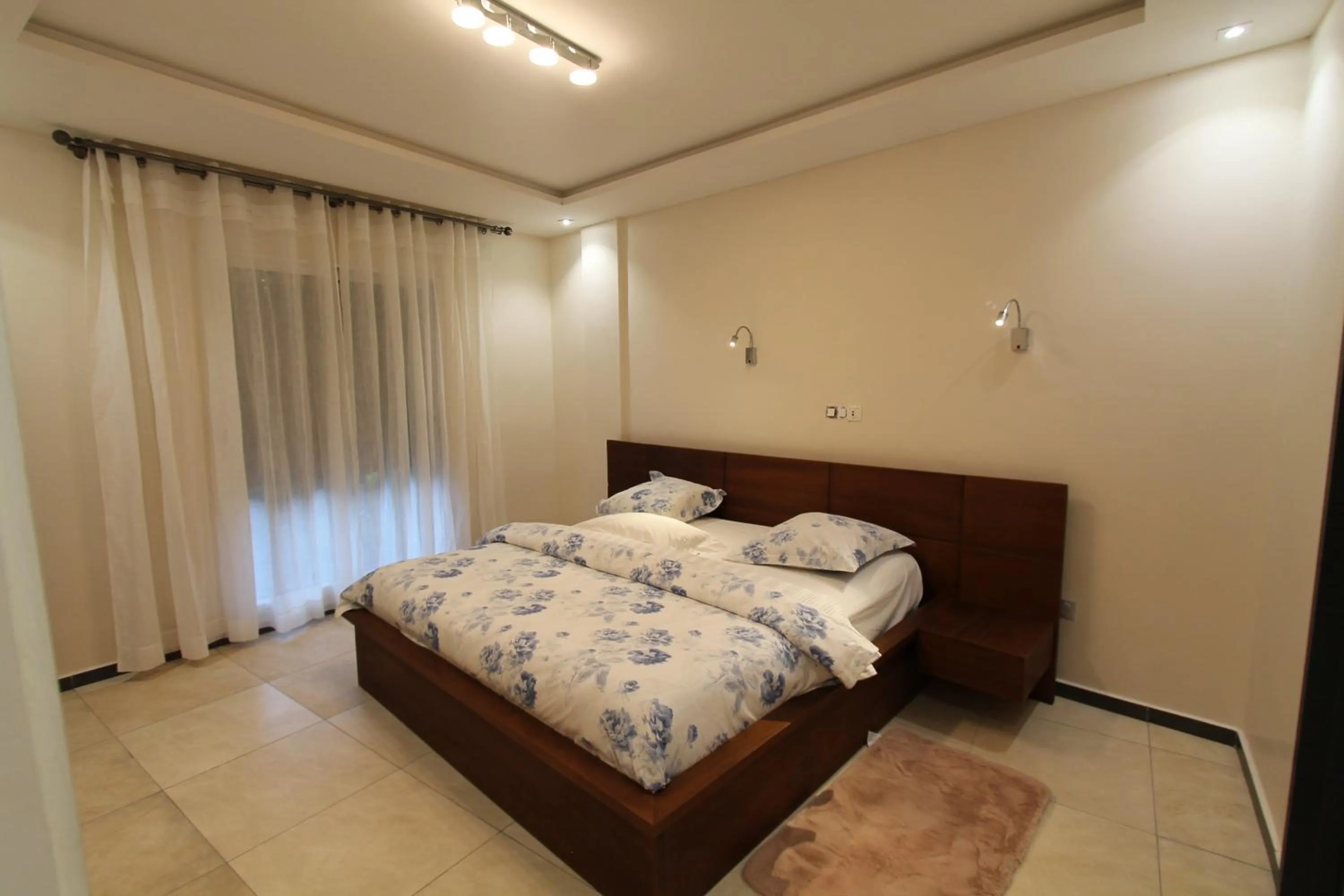 Photo of the whole room, Bed in Residence MASSOU