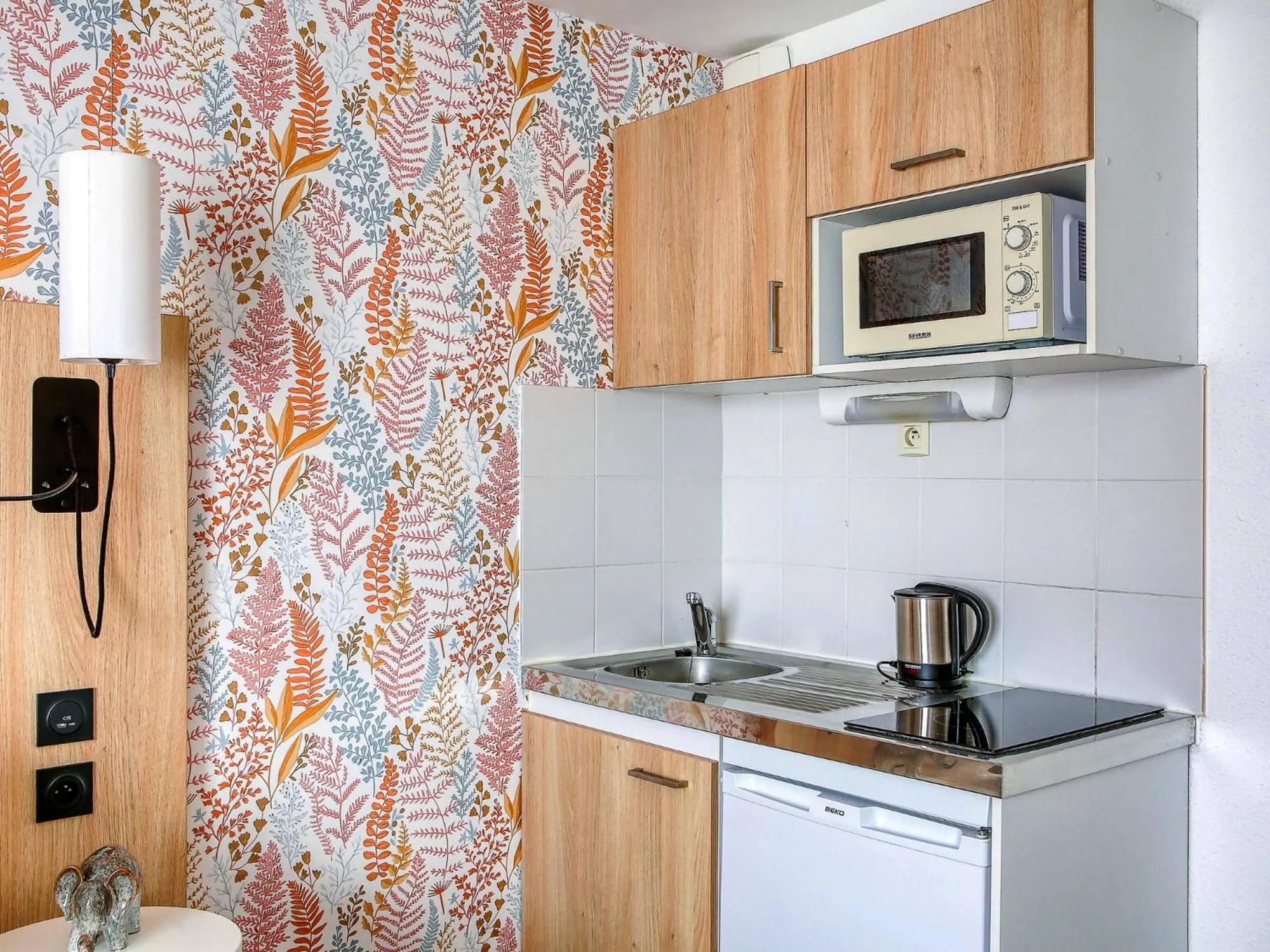 Kitchen or kitchenette in Séjours & Affaires Angers Atrium