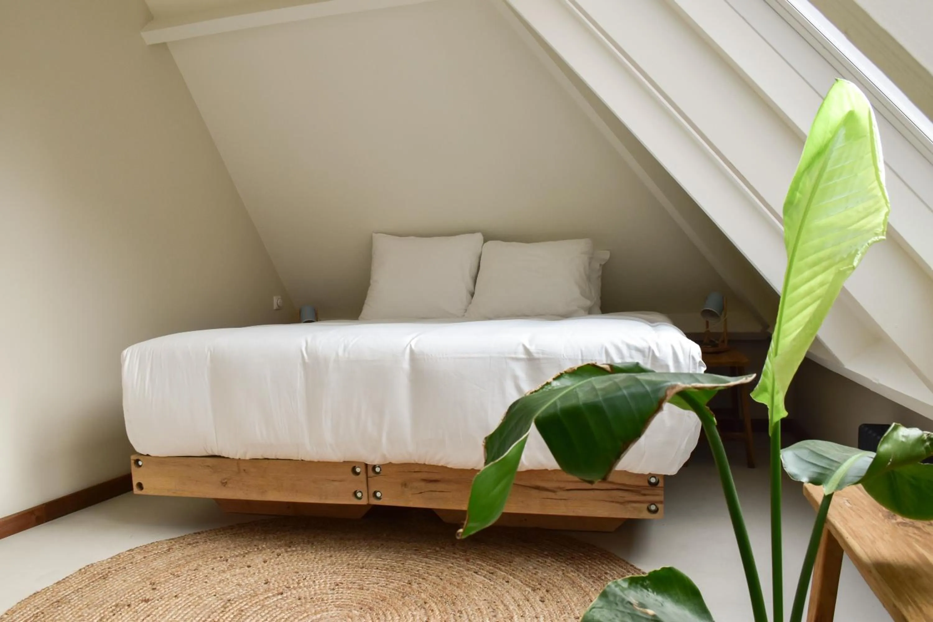 Bed in Van Heeckeren Apartments & Suites Nes