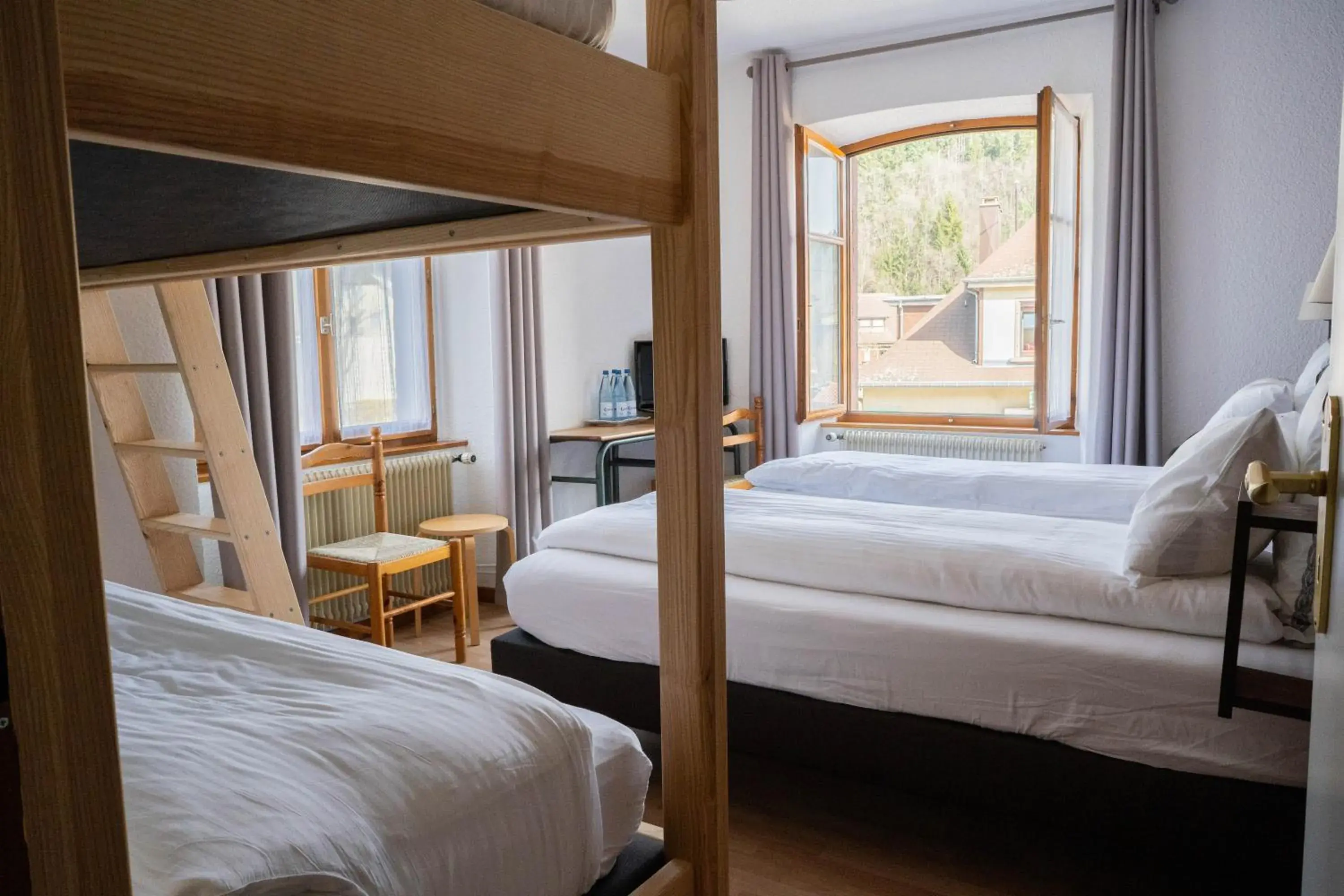 Quadruple Room in Hôtel Au Vieux Moulin Quadruple Room in Hôtel Au Vieux Moulin