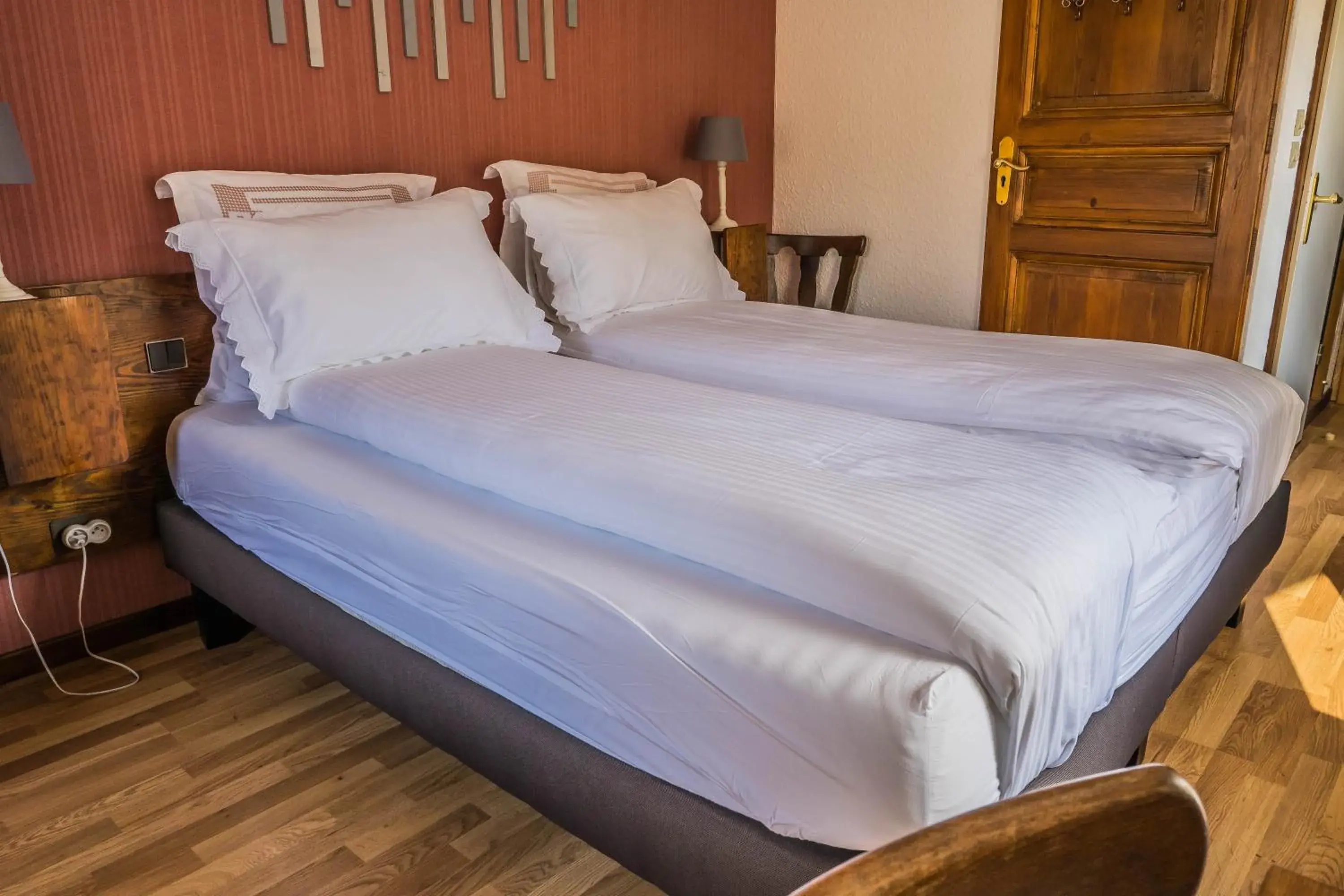 Bed in Hôtel Au Vieux Moulin Bed in Hôtel Au Vieux Moulin