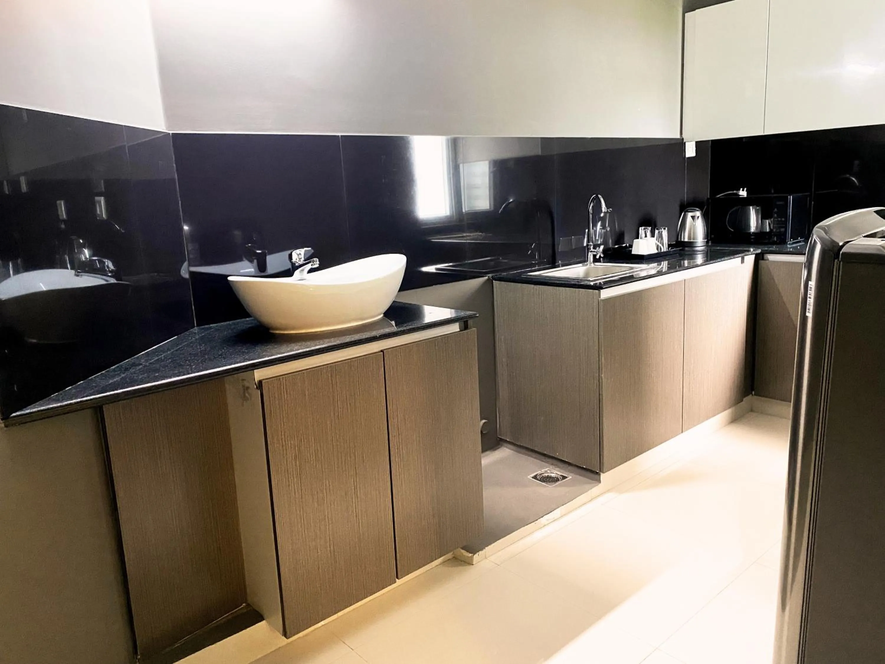 Kitchen or kitchenette in Transit Suites by GrandWest