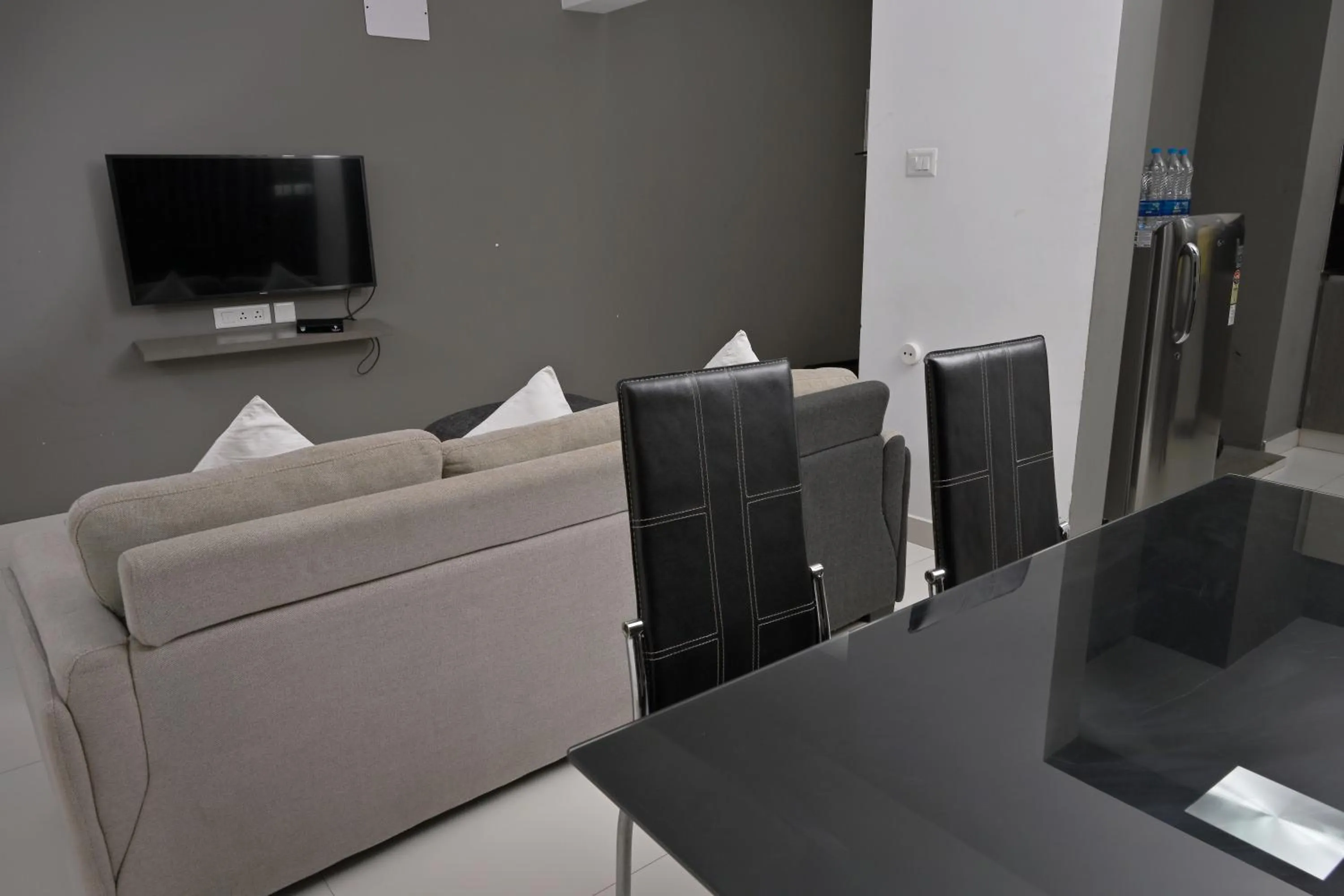 Seating area in Transit Suites by GrandWest