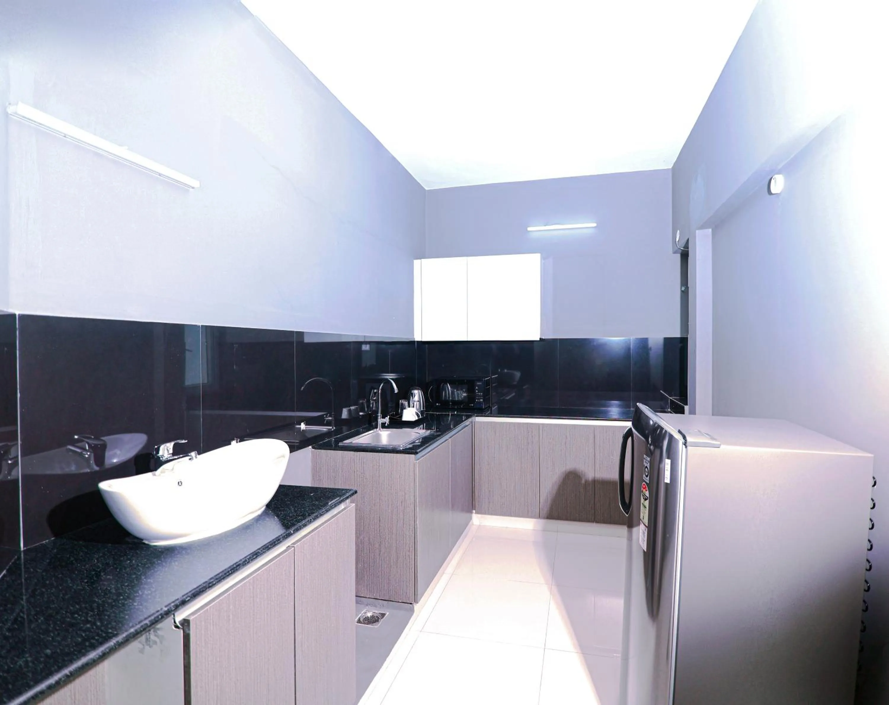 Kitchen or kitchenette in Transit Suites by GrandWest