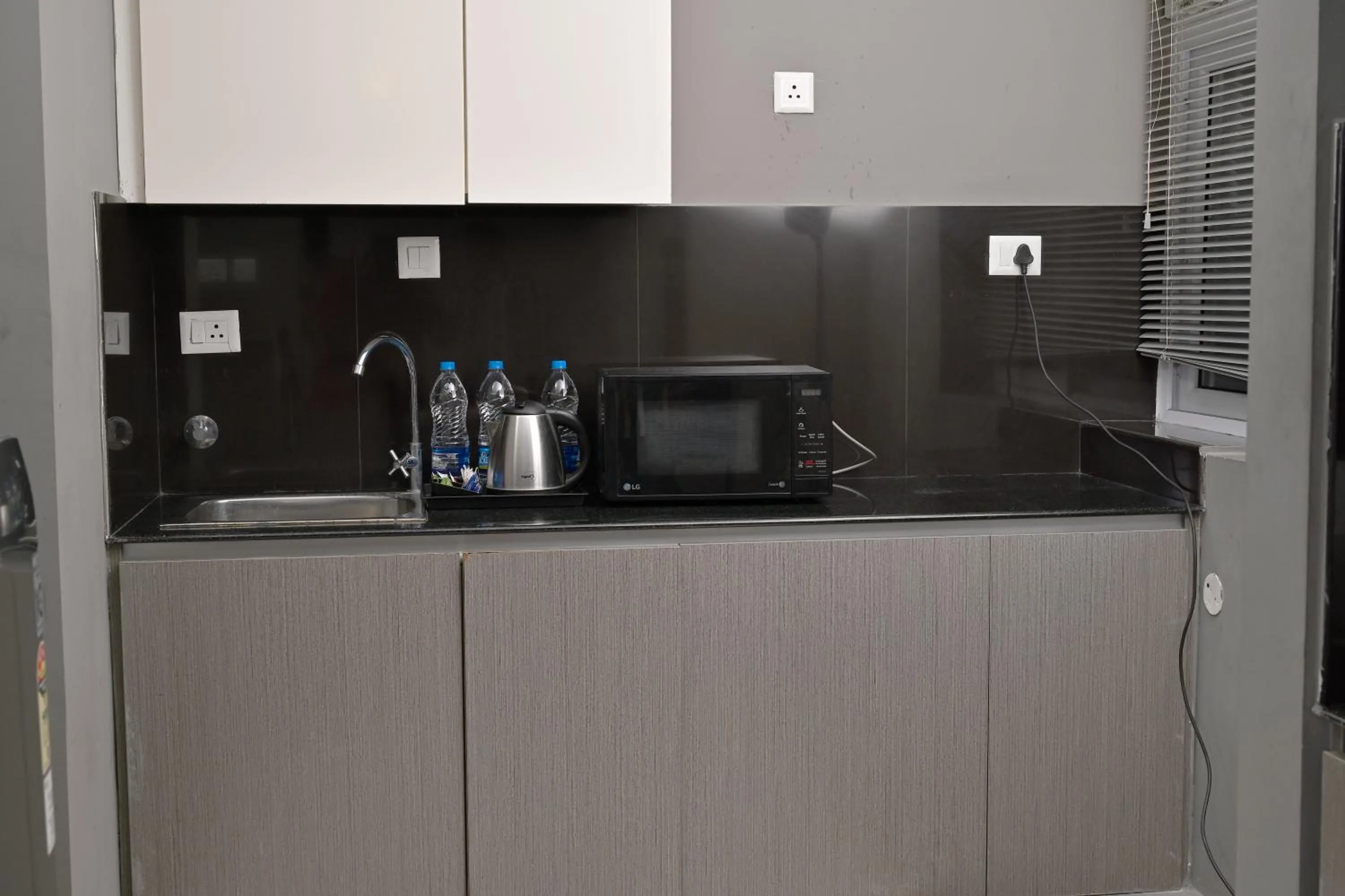 Kitchen or kitchenette in Transit Suites by GrandWest