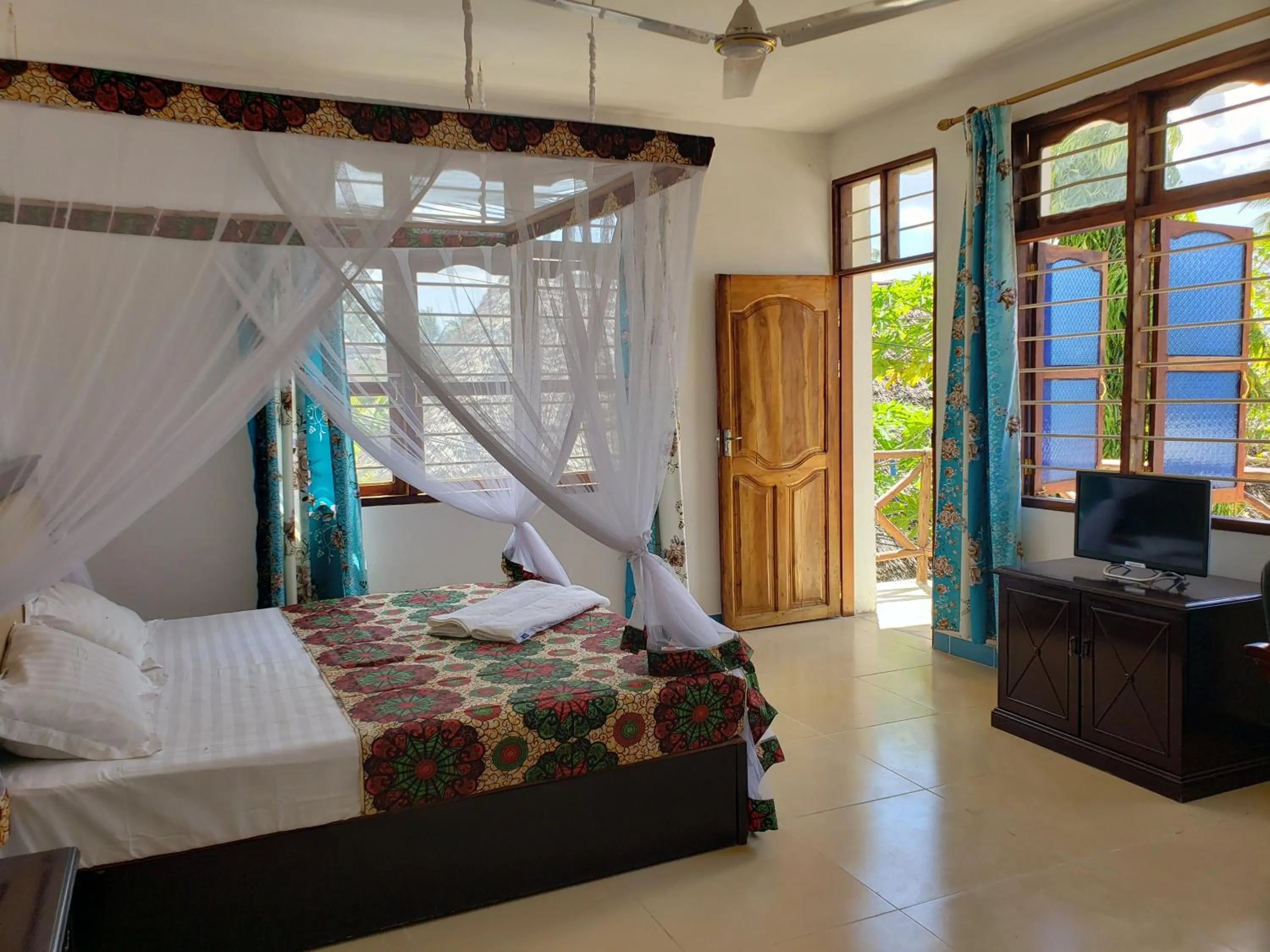 Bed in Khadija Kiwengwa Apartment