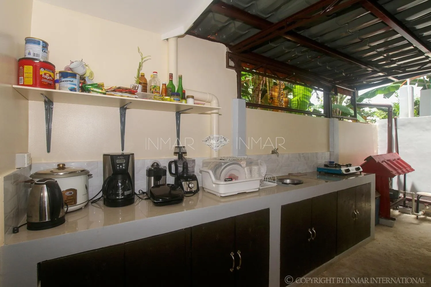 Kitchen or kitchenette in AJ Residences Apartelle