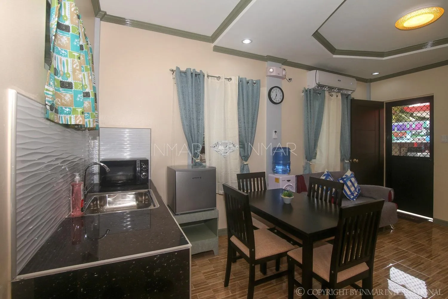 Dining area in AJ Residences Apartelle