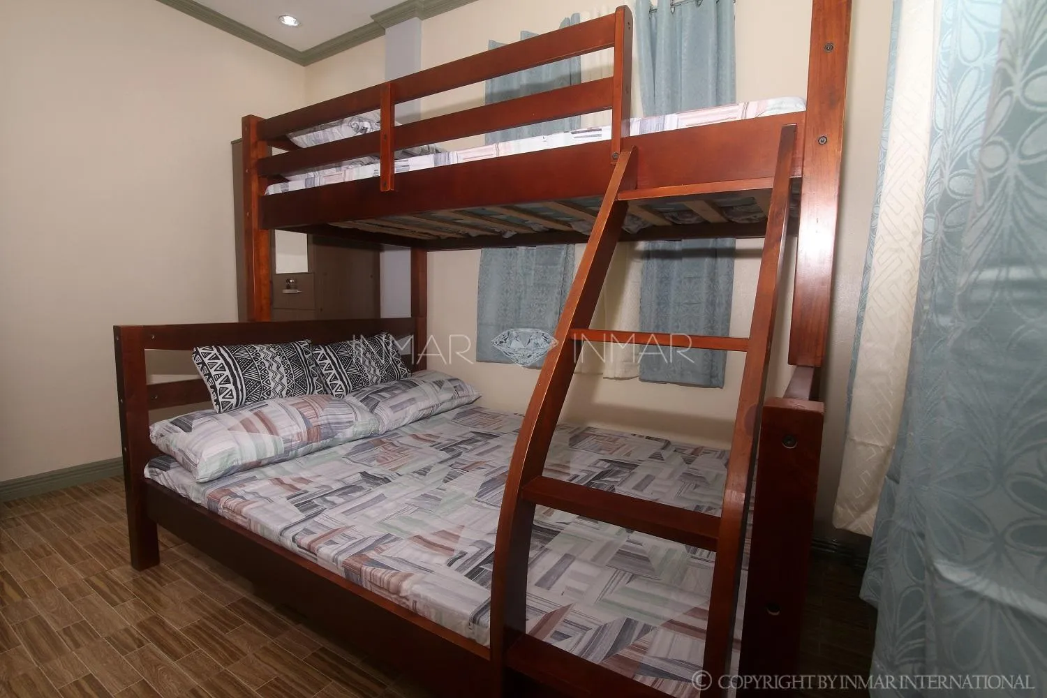bunk bed in AJ Residences Apartelle