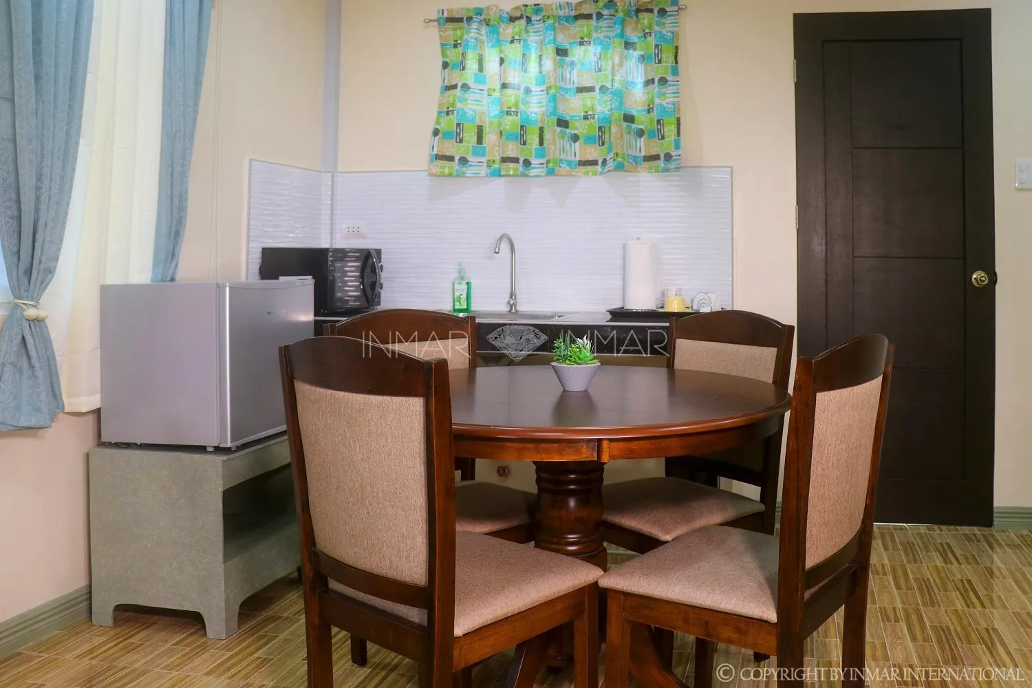 Dining area in AJ Residences Apartelle
