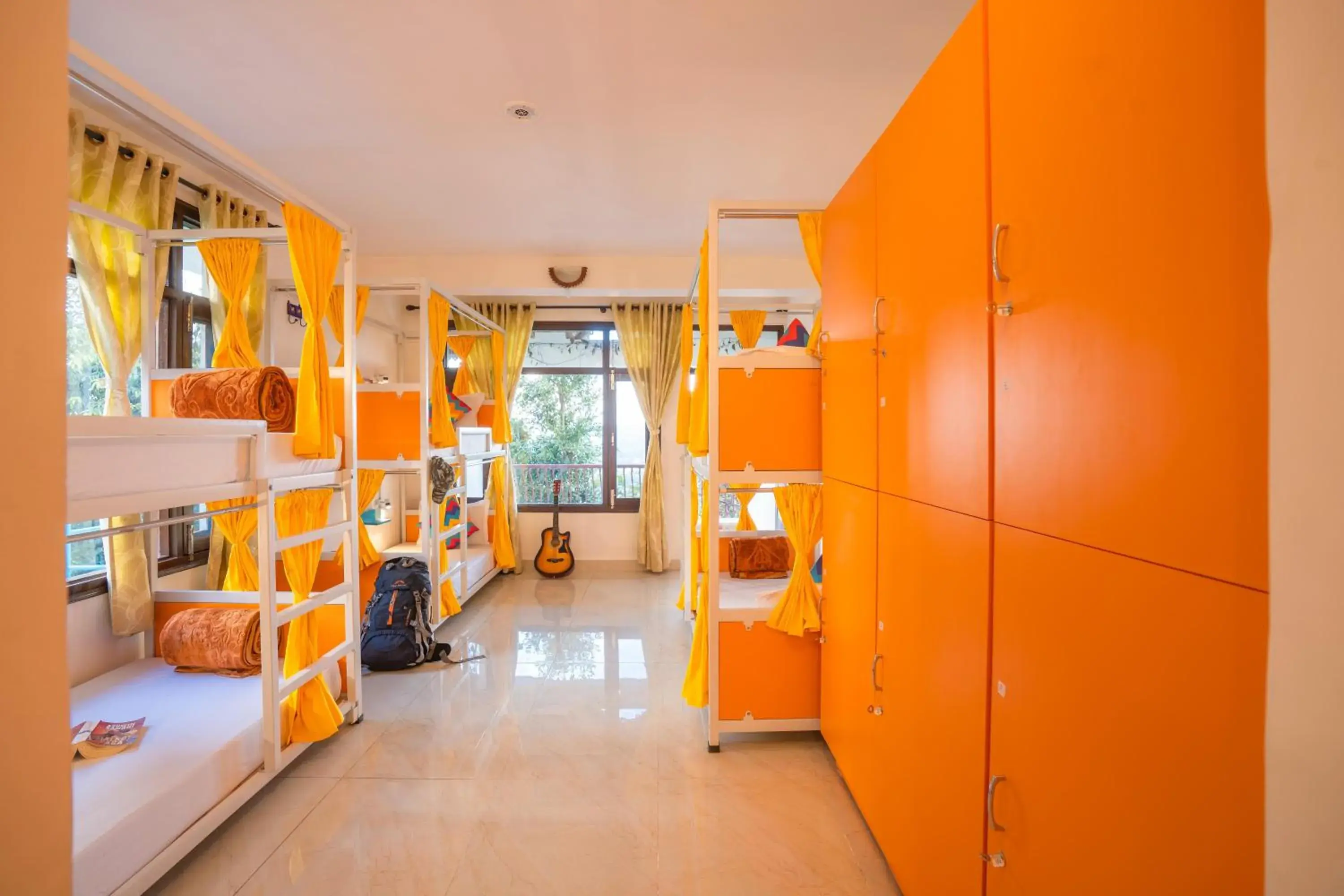 Bed in 6 Bed Mixed Dormitory Room with Ensuite Bathroom in goSTOPS Mukteshwar Bed in 6 Bed Mixed Dormitory Room with Ensuite Bathroom in goSTOPS Mukteshwar