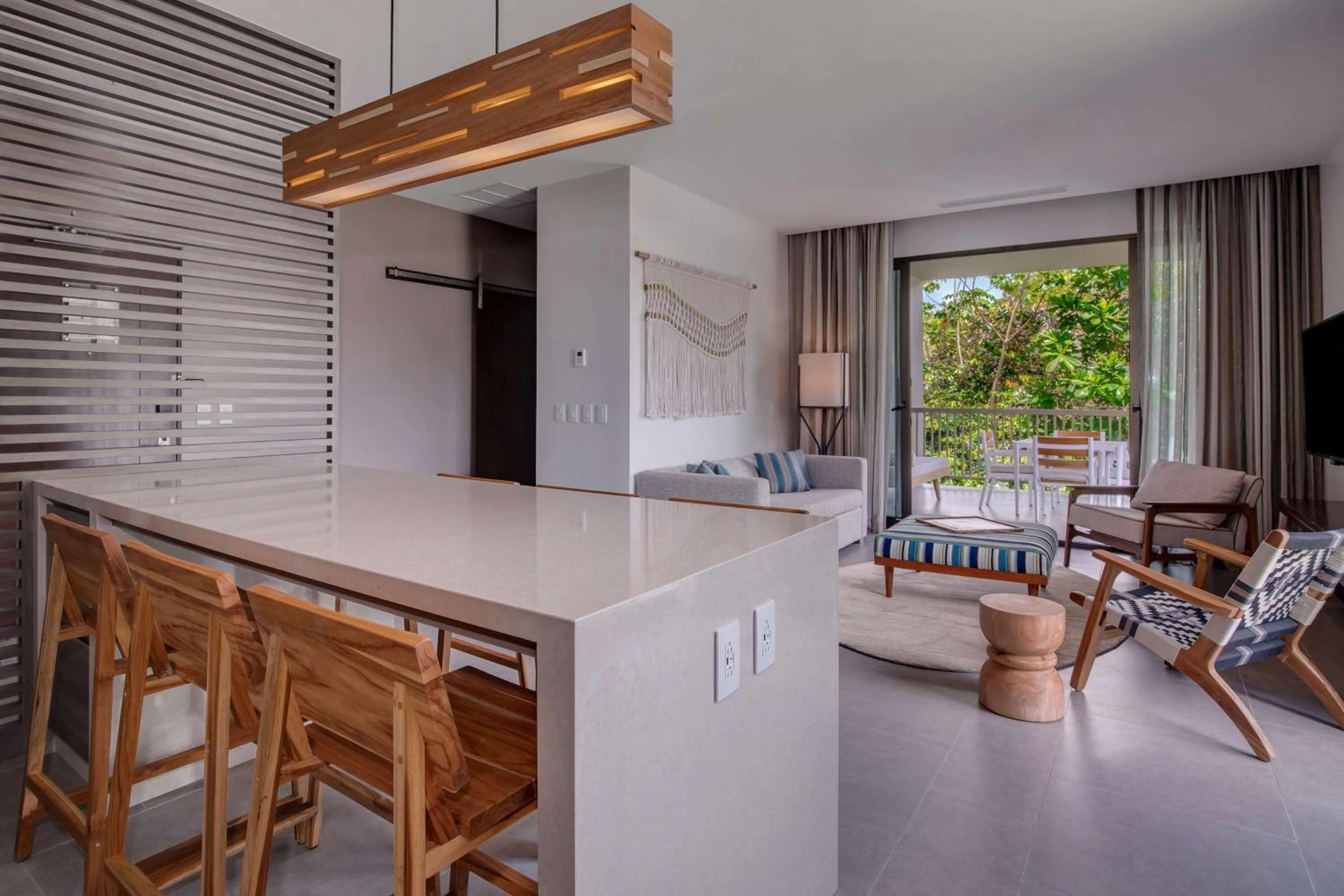 Living room in Botanika Osa Peninsula, Curio Collection By Hilton