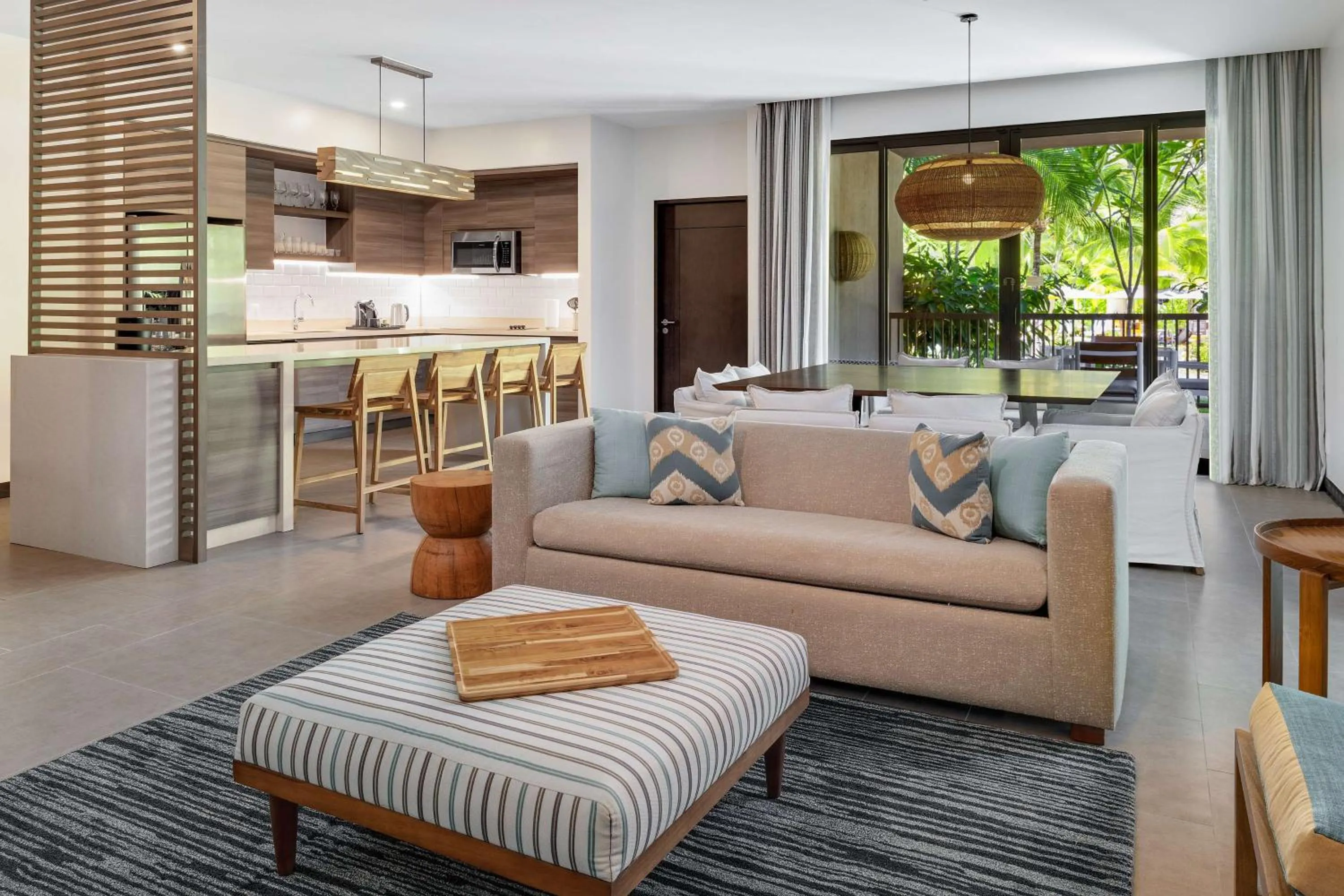 Living room in Botanika Osa Peninsula, Curio Collection By Hilton