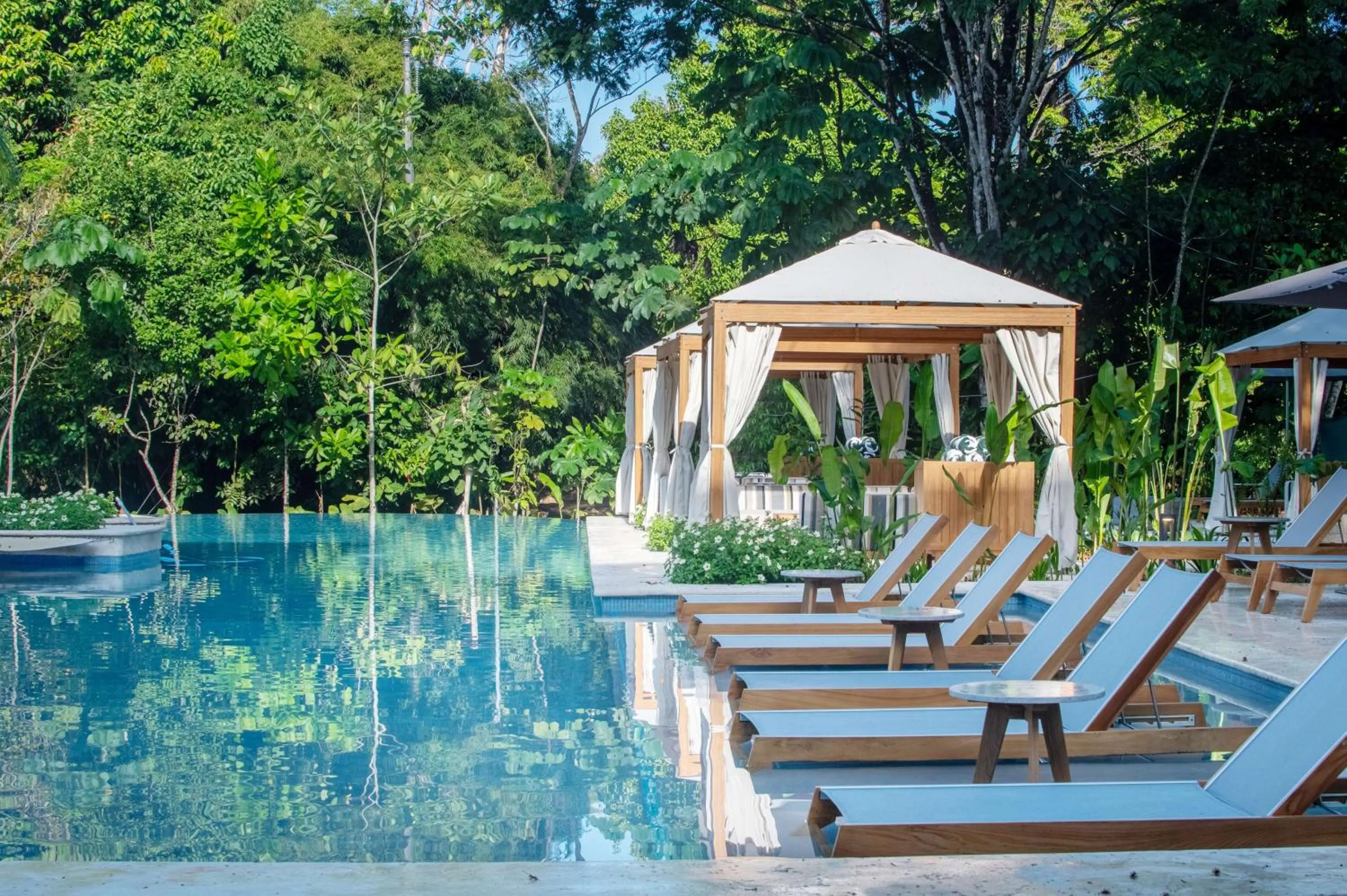 Pool view in Botanika Osa Peninsula, Curio Collection By Hilton
