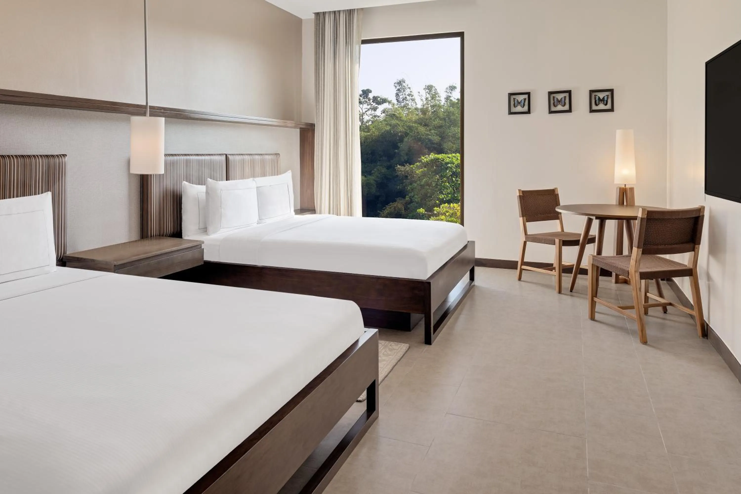 Bed in Botanika Osa Peninsula, Curio Collection By Hilton