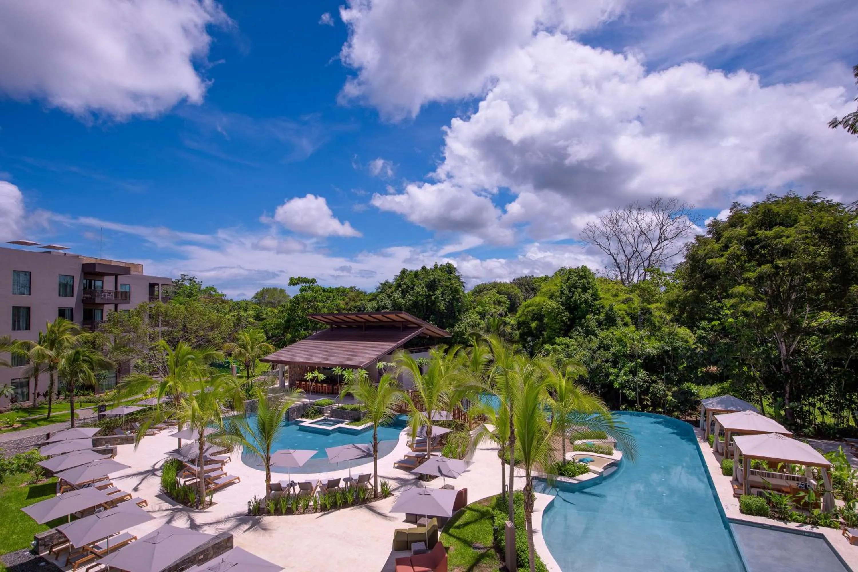 Pool view in Botanika Osa Peninsula, Curio Collection By Hilton