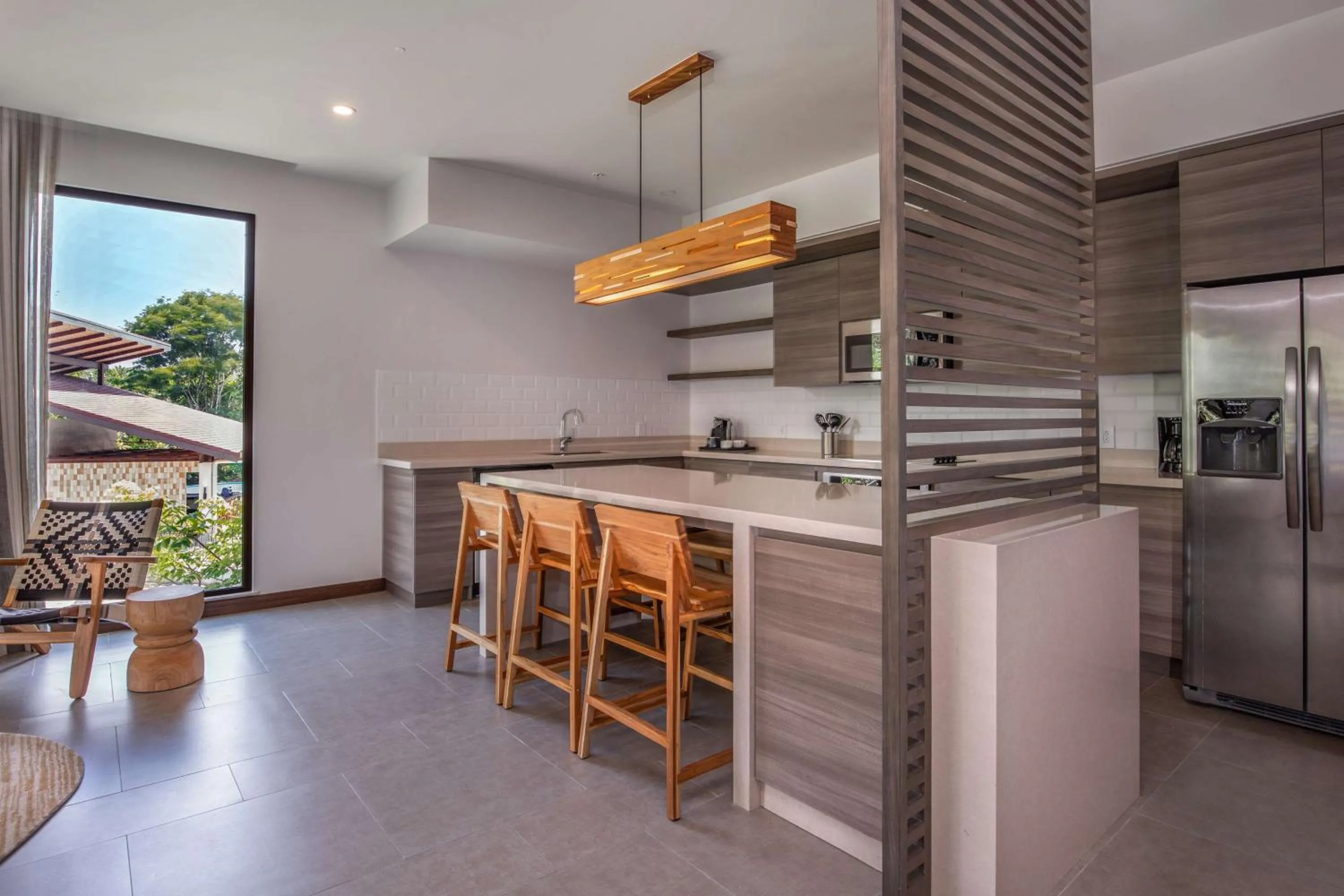 Kitchen or kitchenette in Botanika Osa Peninsula, Curio Collection By Hilton