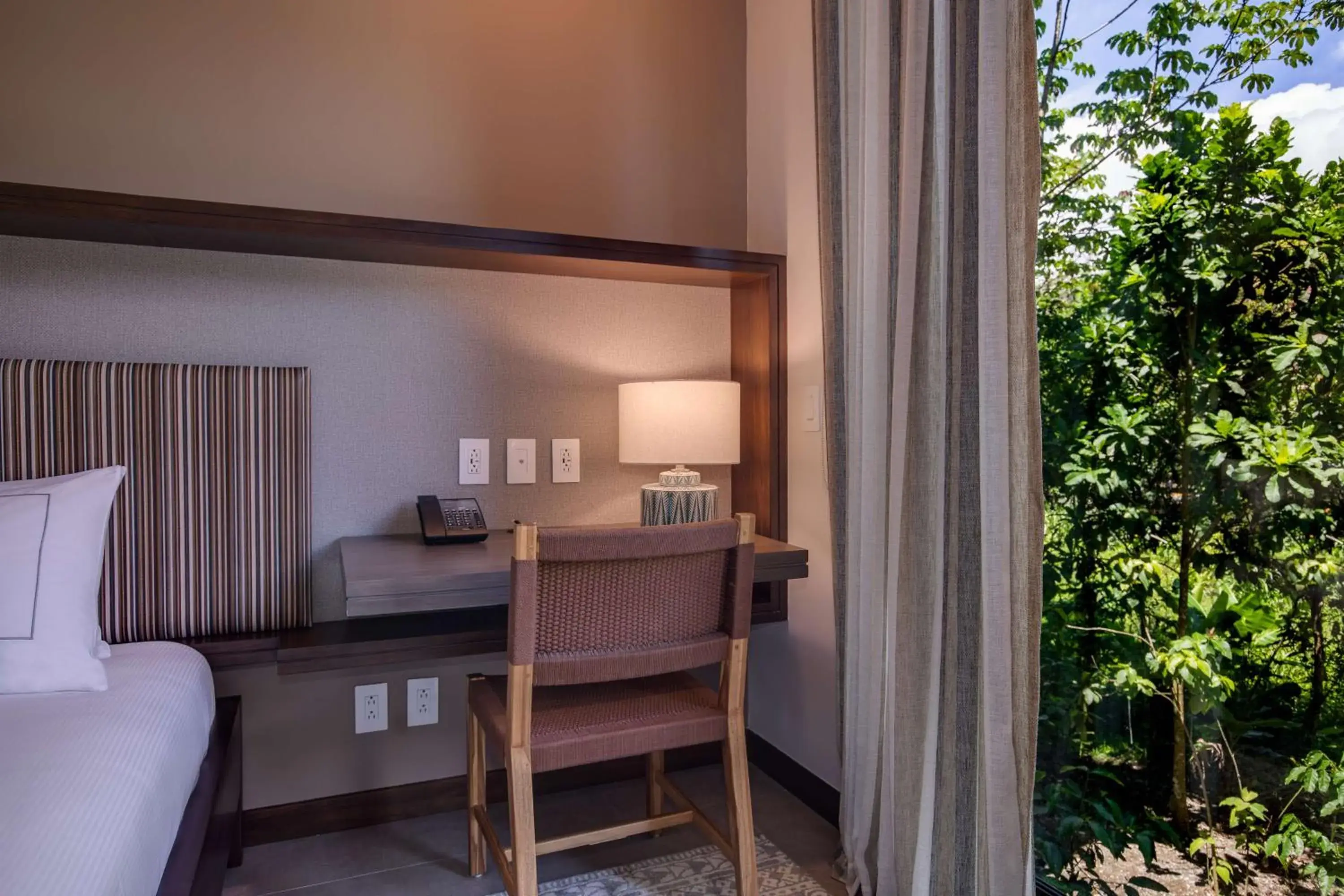 Bed in Botanika Osa Peninsula, Curio Collection By Hilton Bed in Botanika Osa Peninsula, Curio Collection By Hilton