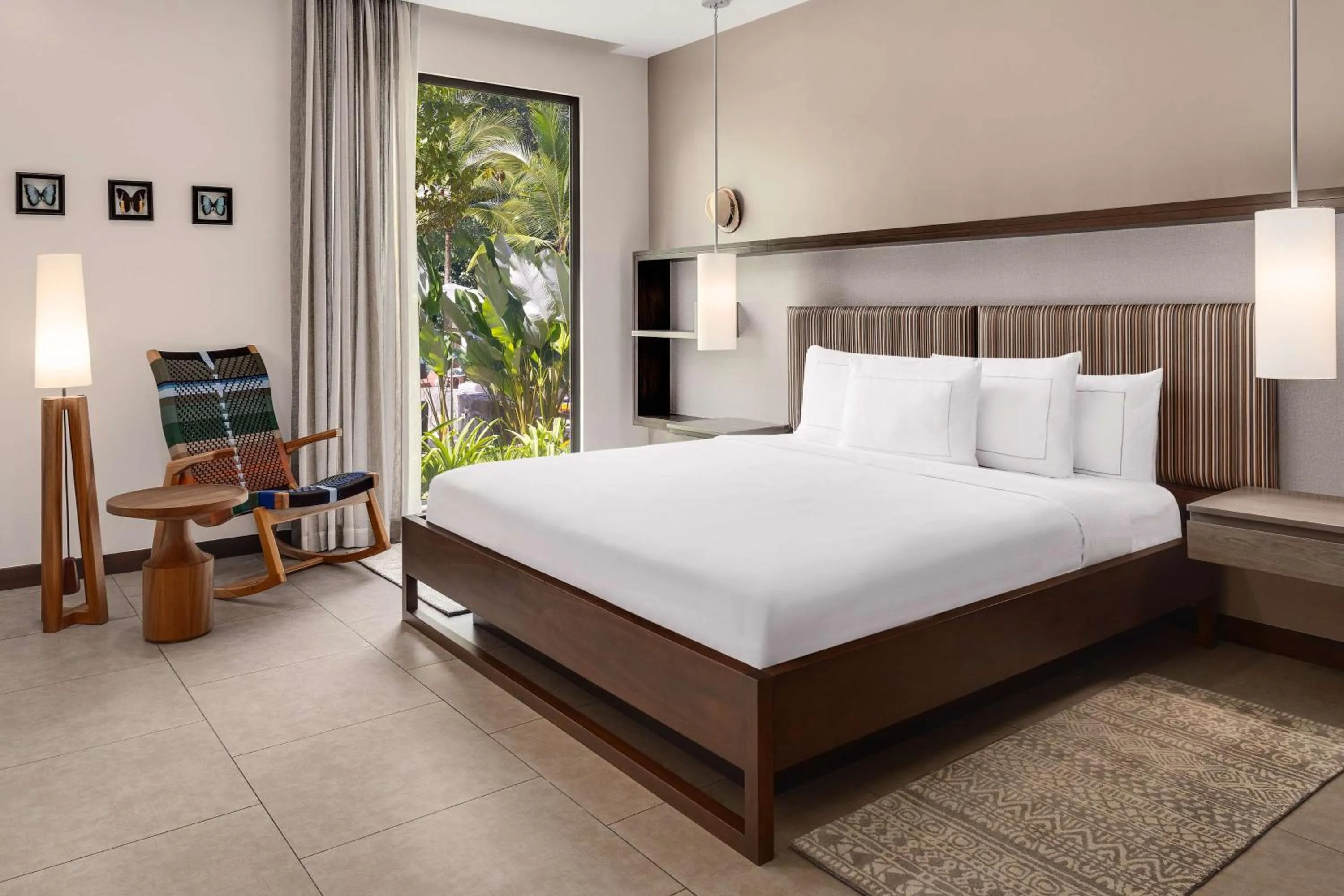 Bed in Botanika Osa Peninsula, Curio Collection By Hilton