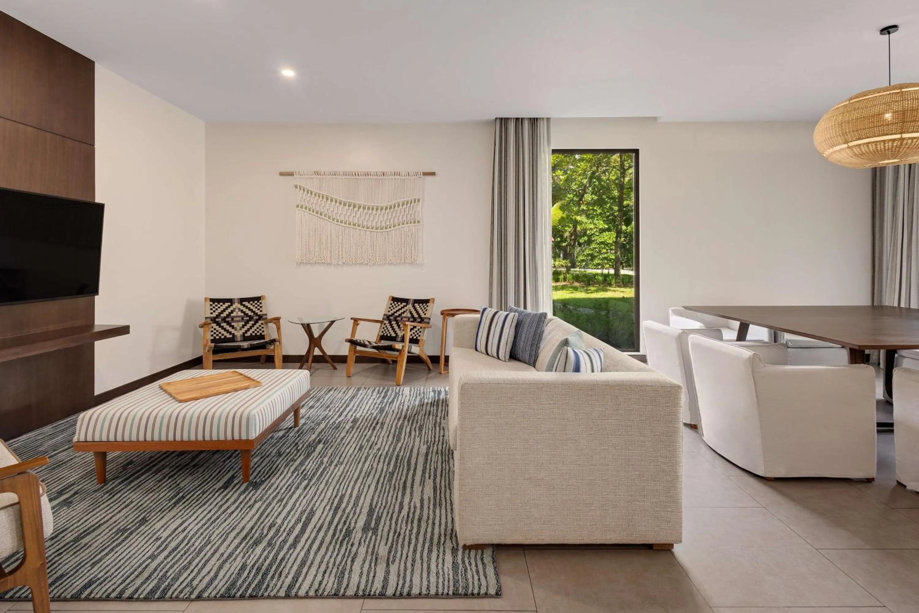 Living room in Botanika Osa Peninsula, Curio Collection By Hilton