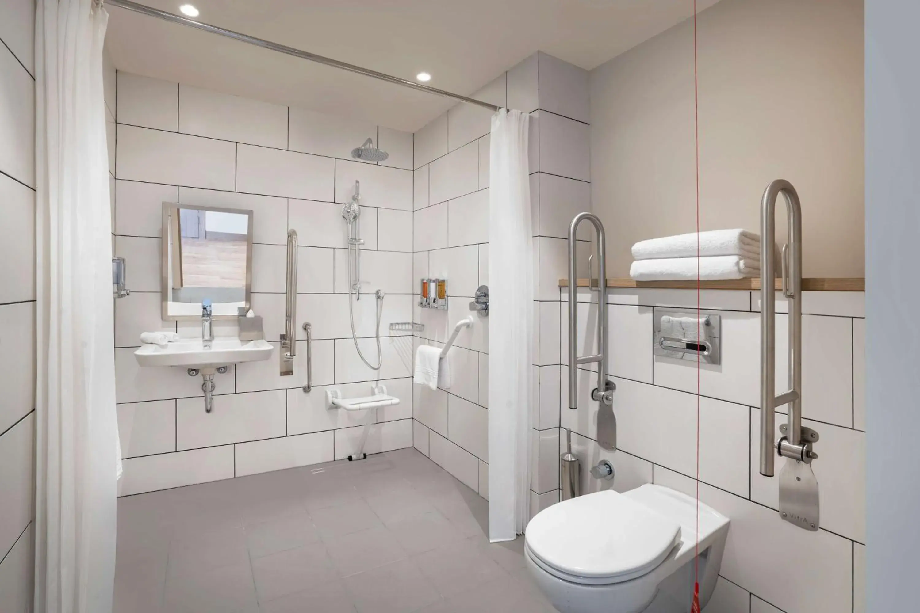 Bathroom in Hampton By Hilton Tashkent Bathroom in Hampton By Hilton Tashkent