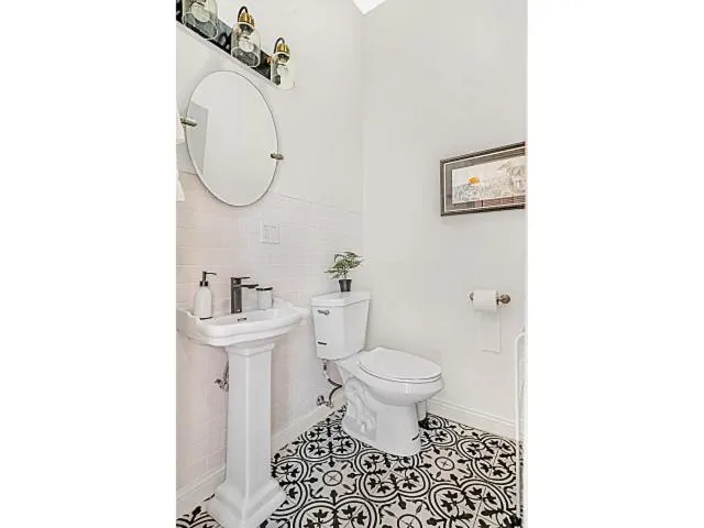 Toilet in Spacious 5-BR Apt next to transit Free Parking