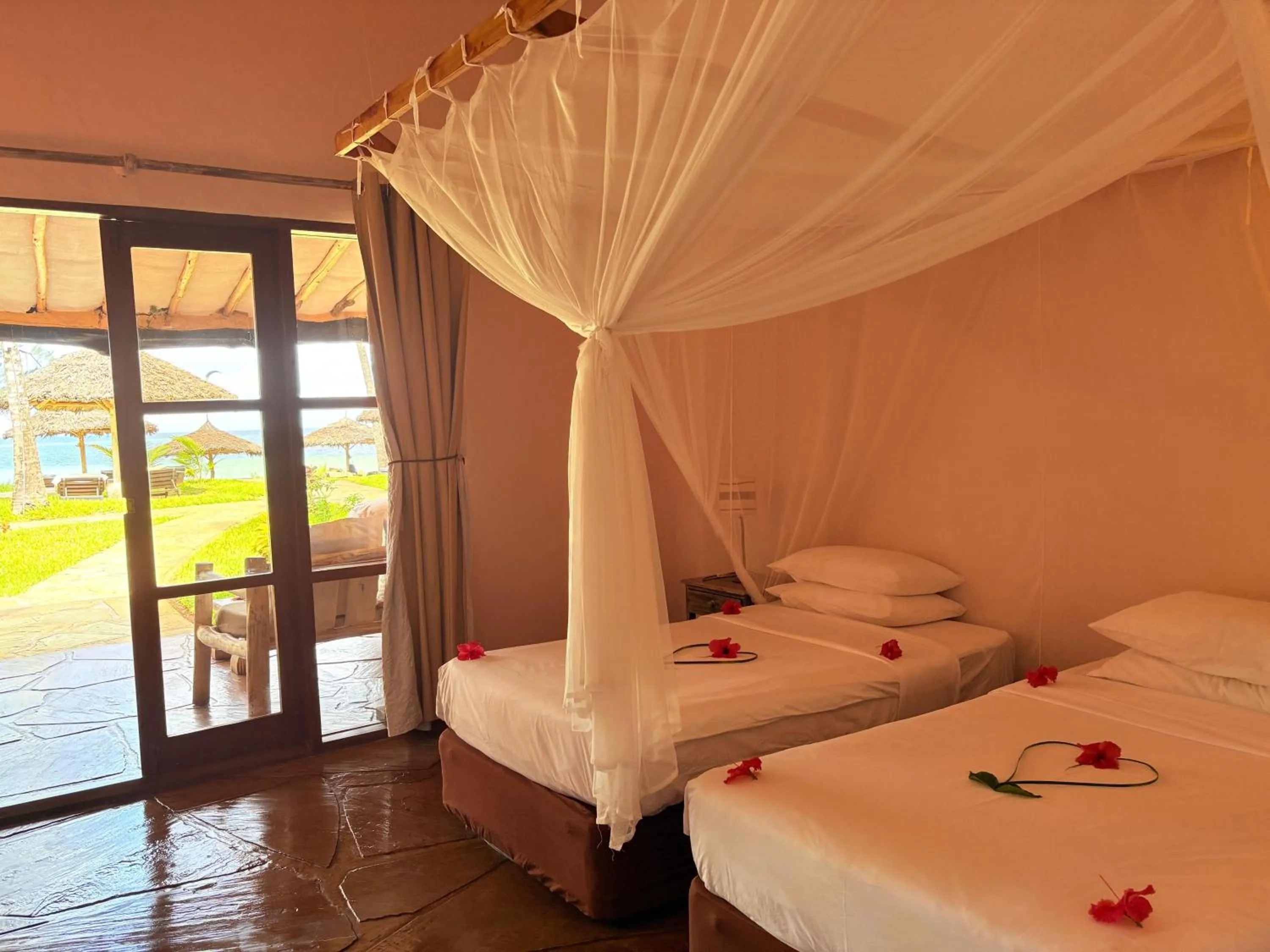 Bed in Eleven Pearl Boutique Hotel & Spa