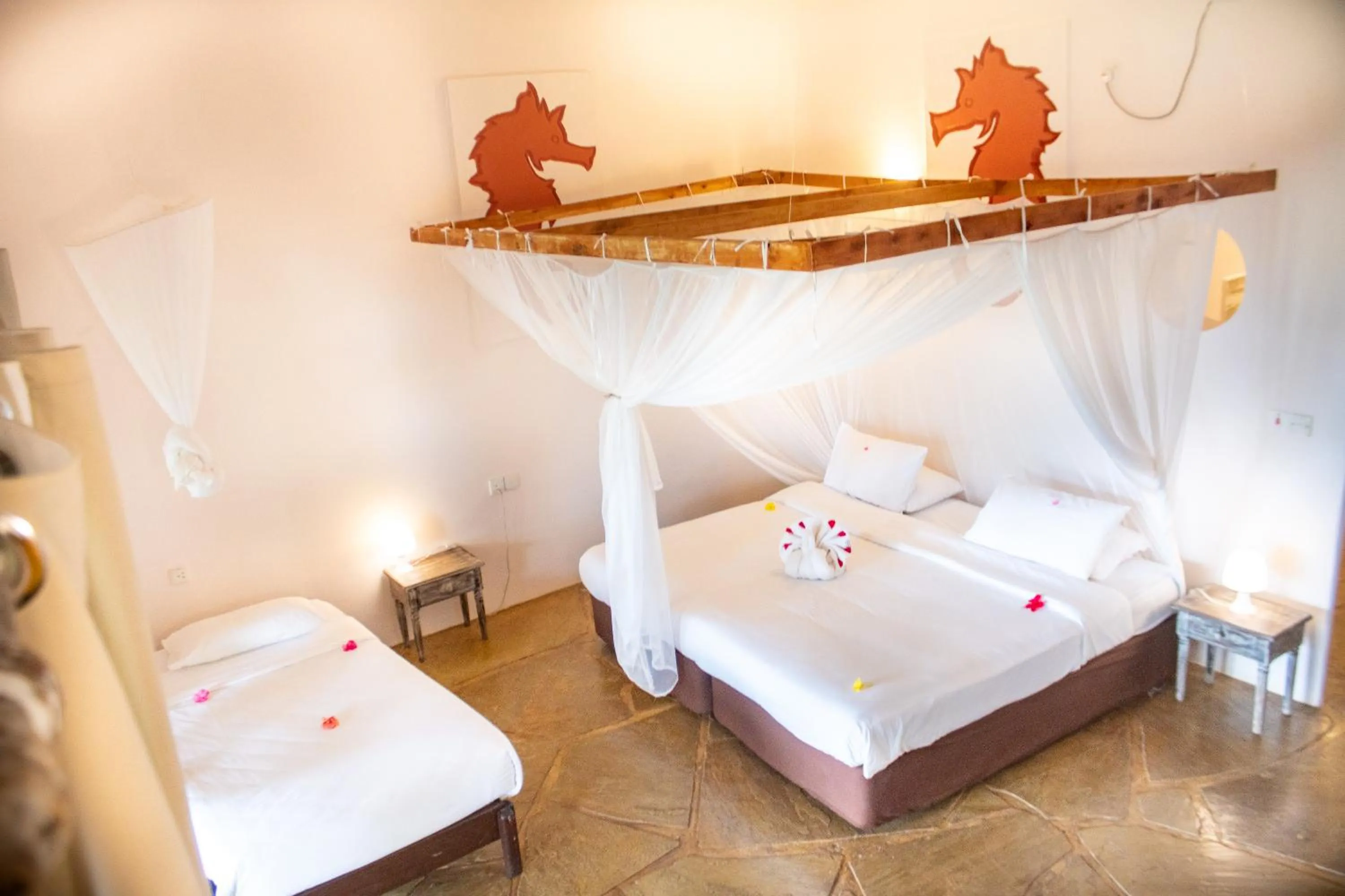 Bed in Eleven Pearl Boutique Hotel & Spa