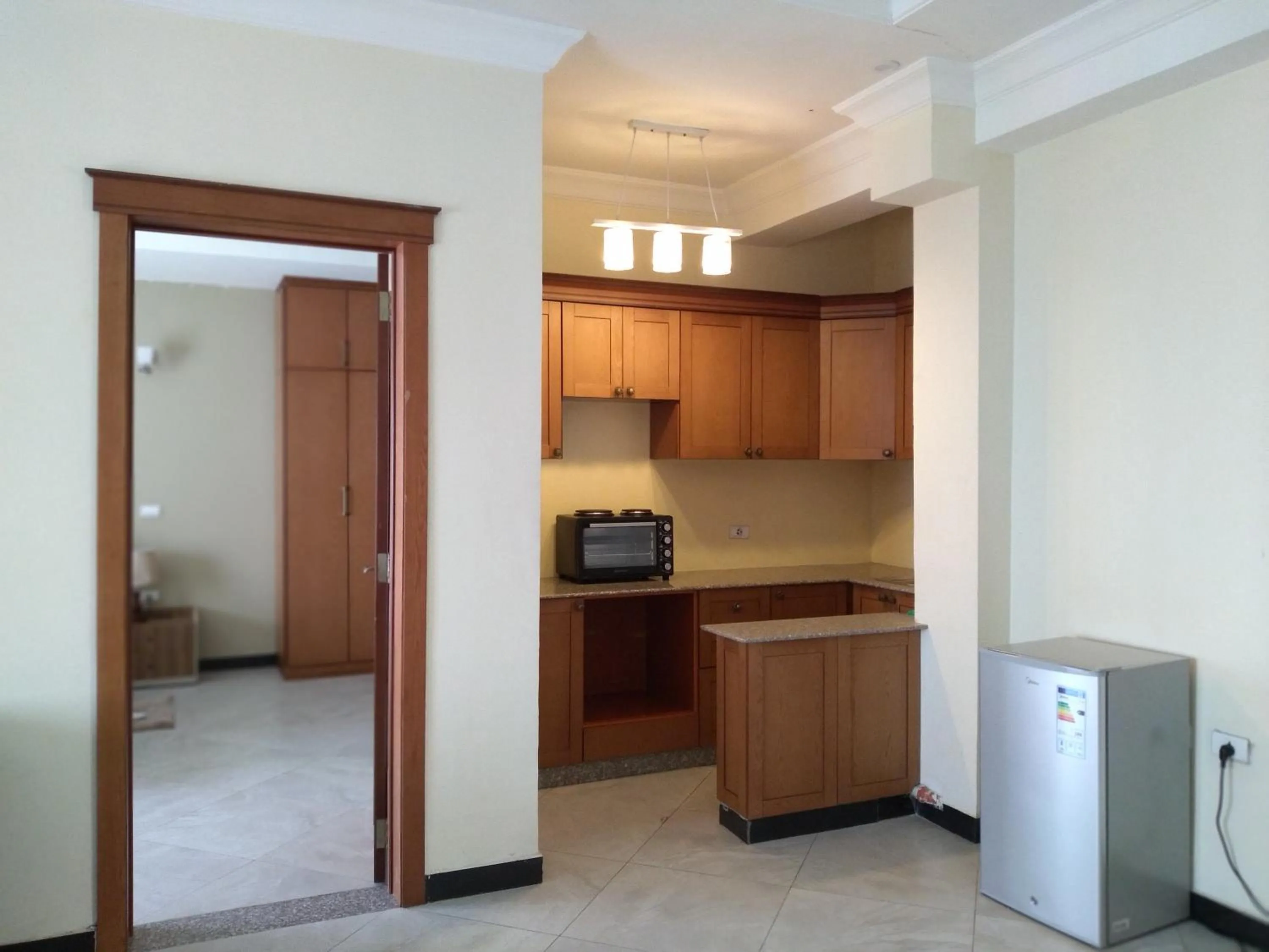 Kitchen or kitchenette in Daisy Hotel