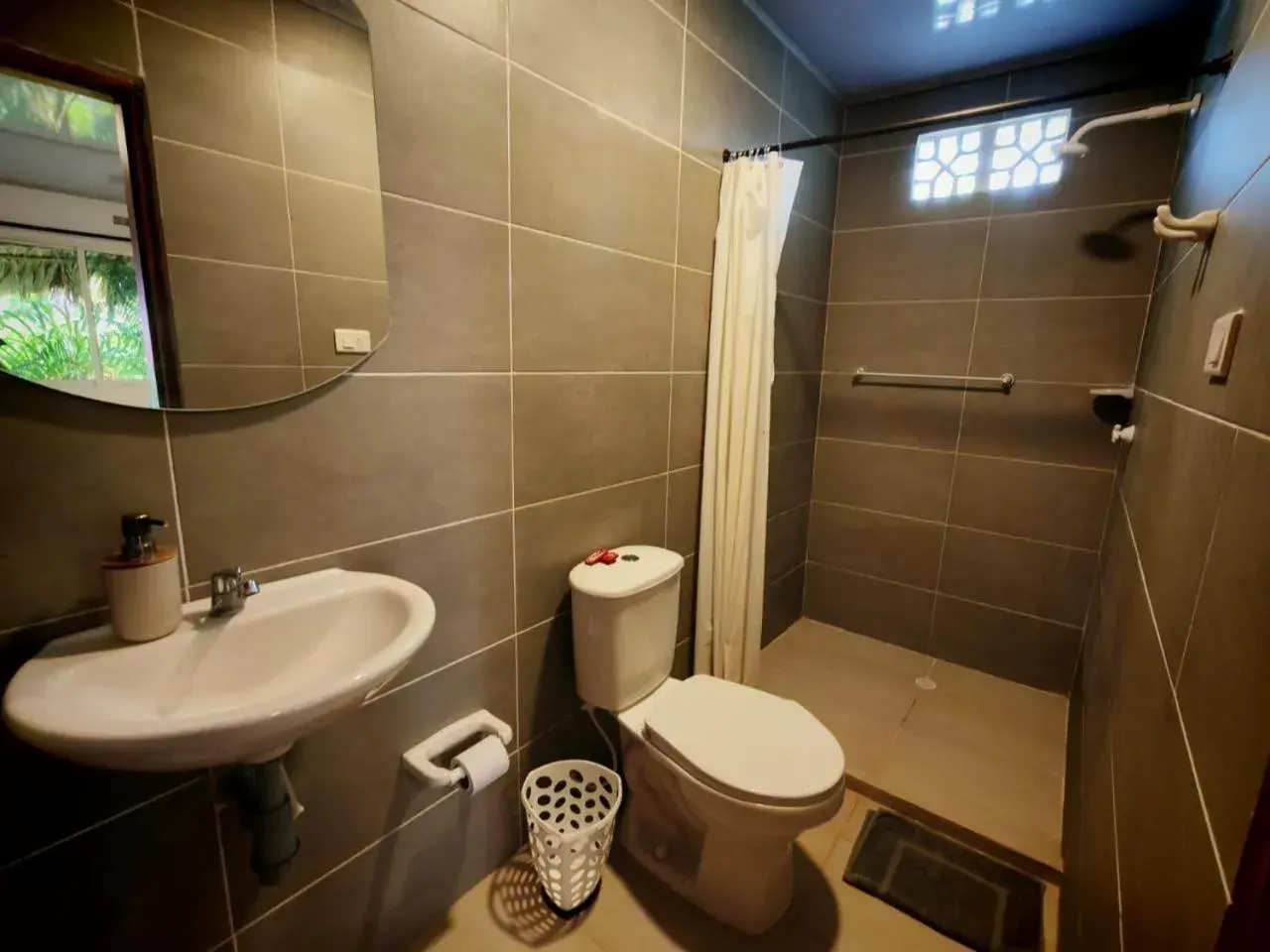 Quadruple Room with Garden View in Tata Lolo Quadruple Room with Garden View in Tata Lolo