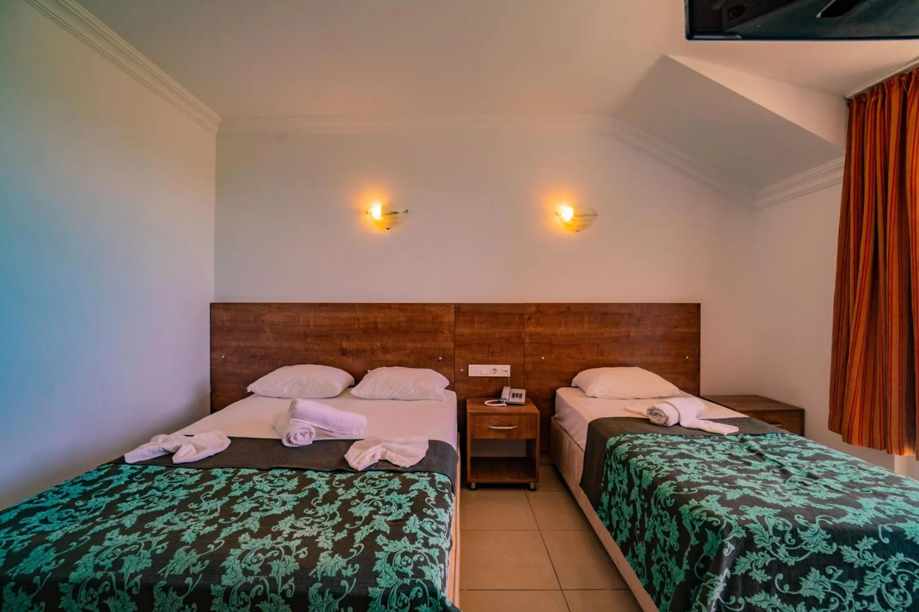 Bed in Prenses Sealine Beach Hotel