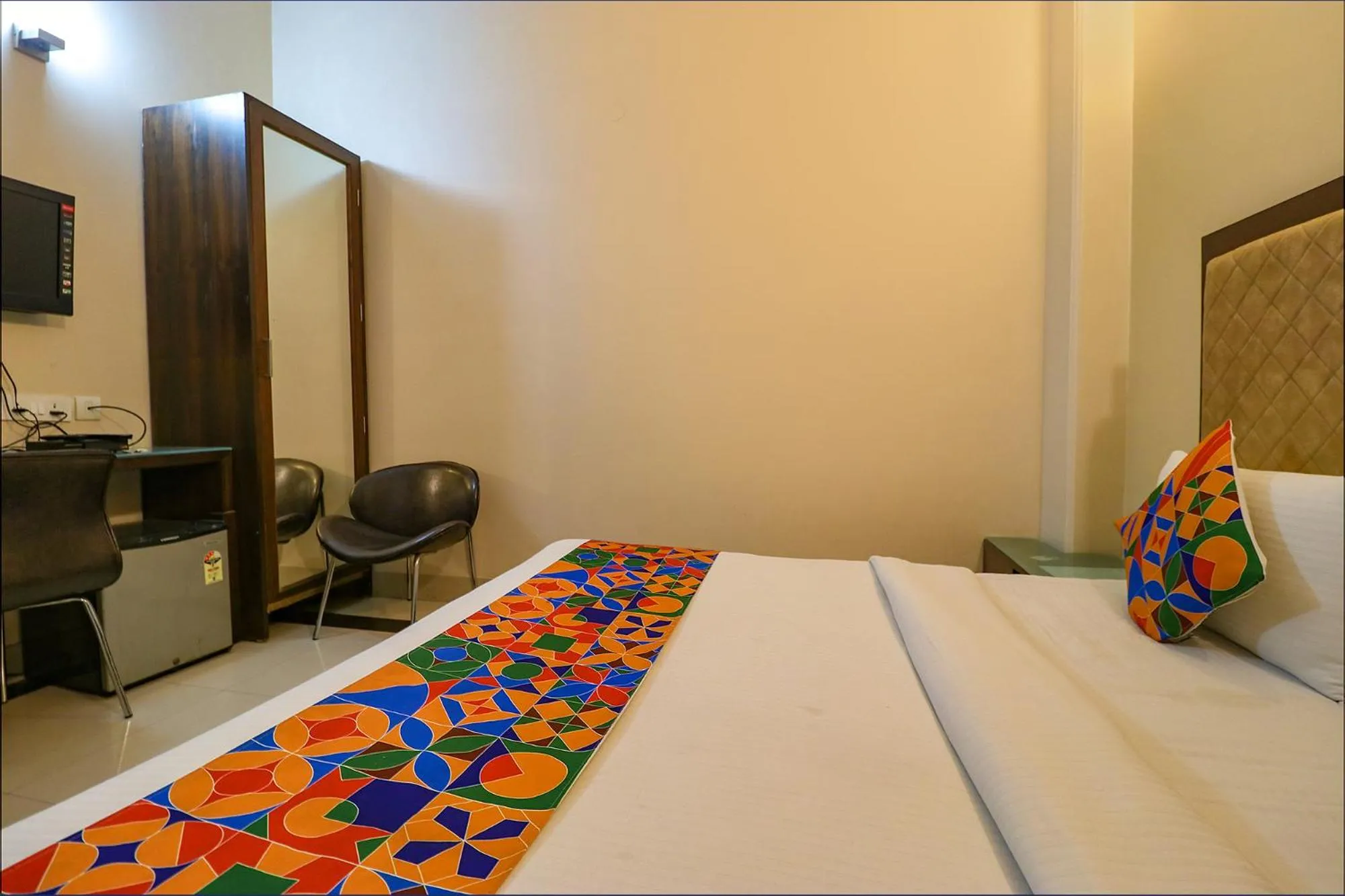 Bed in FabExpress Llyod Residency