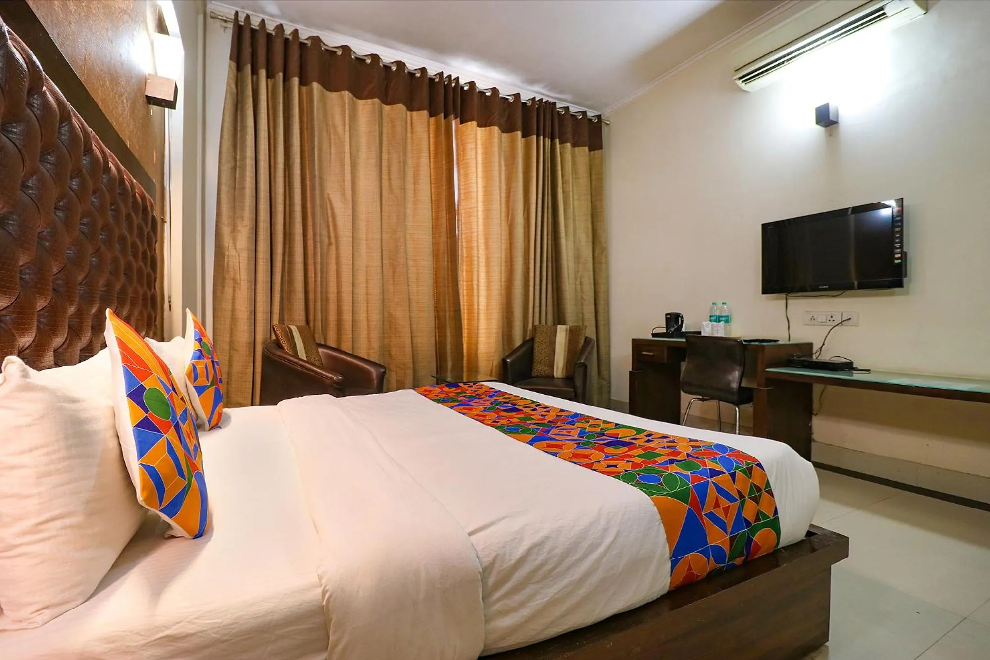 Bed in FabExpress Llyod Residency