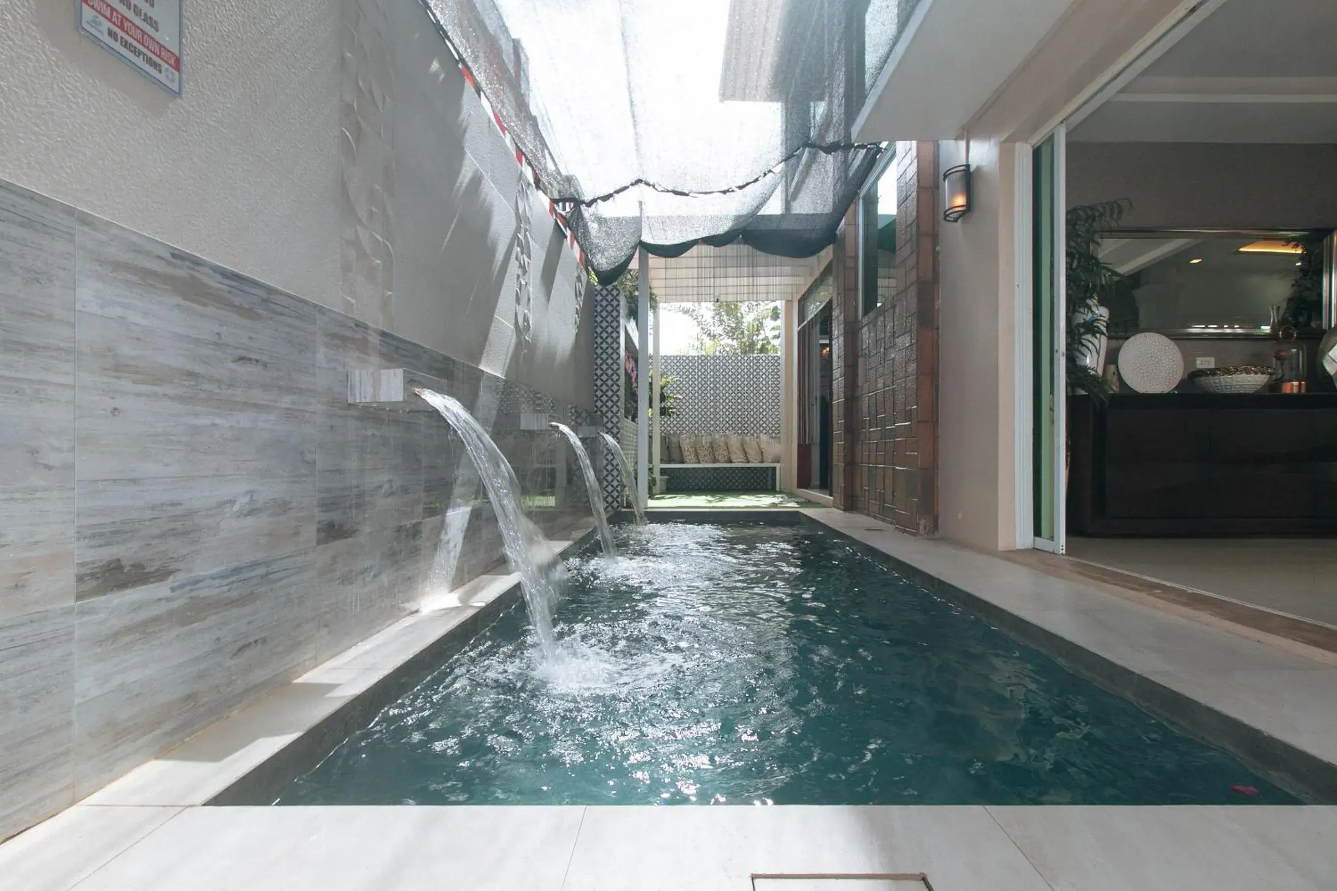 Pool view in RedDoorz Hostel @ St. Paul Village LapuLapu Pool view in RedDoorz Hostel @ St. Paul Village LapuLapu