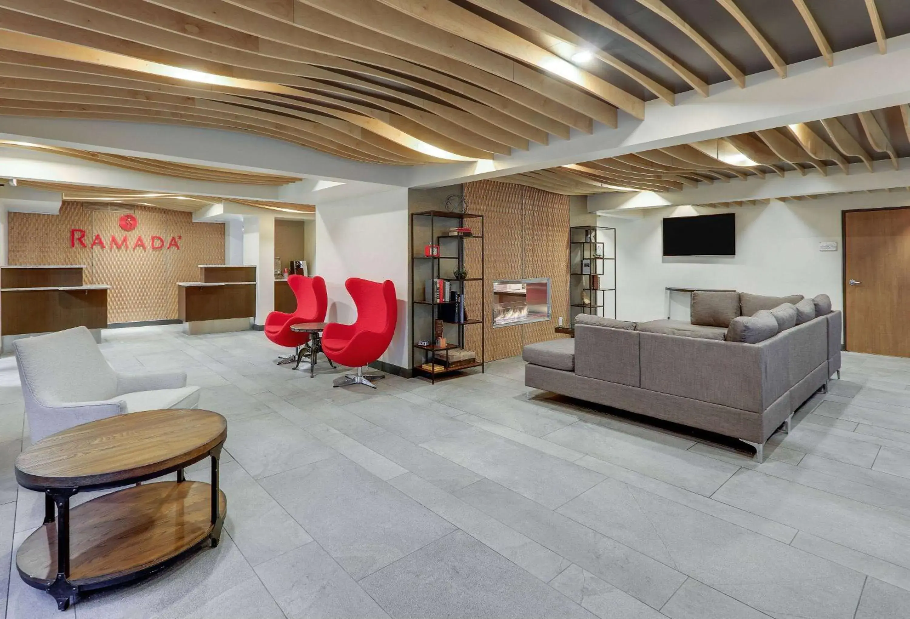 Lobby or reception in Ramada by Wyndham Austin South Lobby or reception in Ramada by Wyndham Austin South