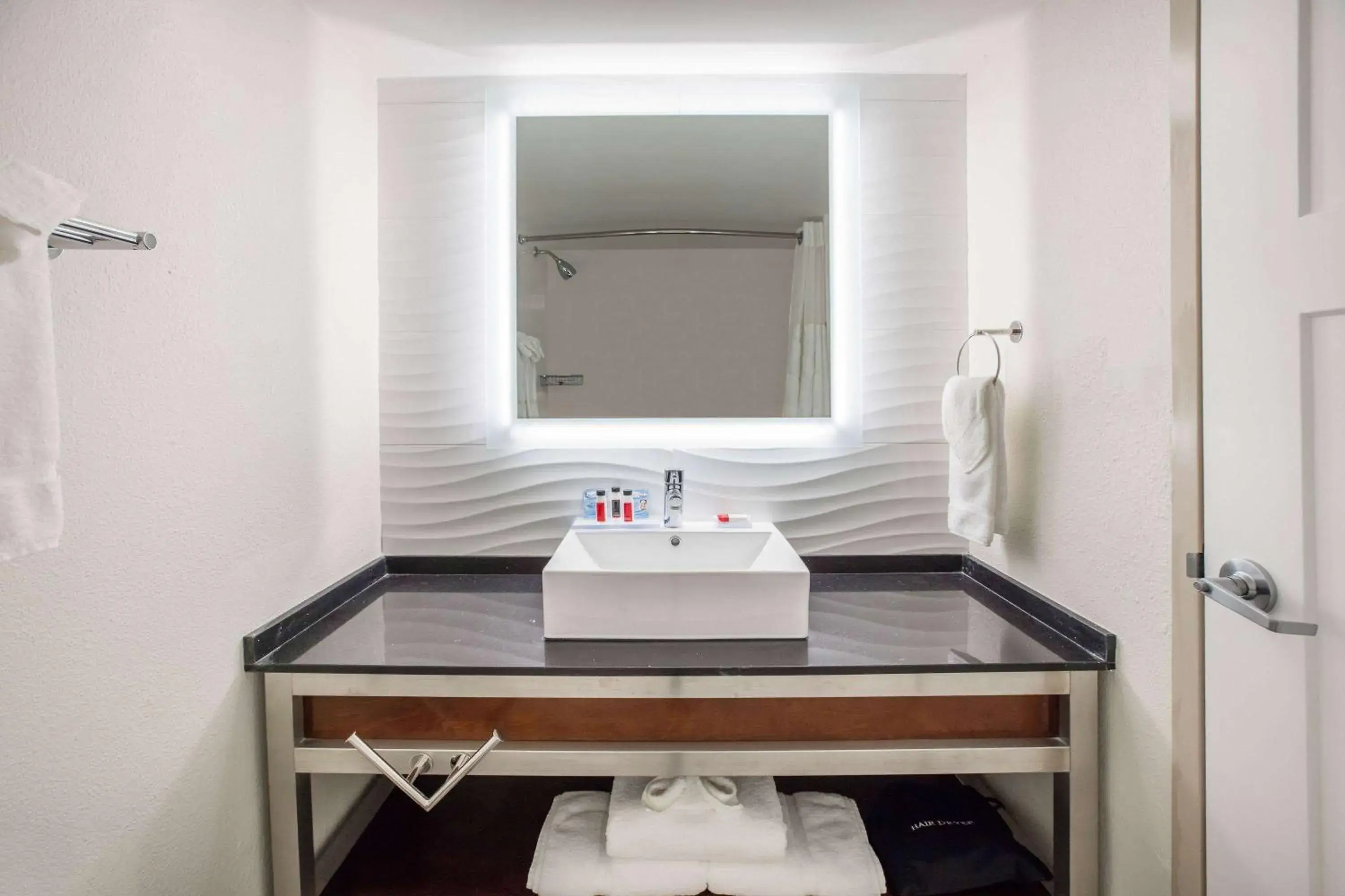 Bathroom in Ramada by Wyndham Austin South Bathroom in Ramada by Wyndham Austin South