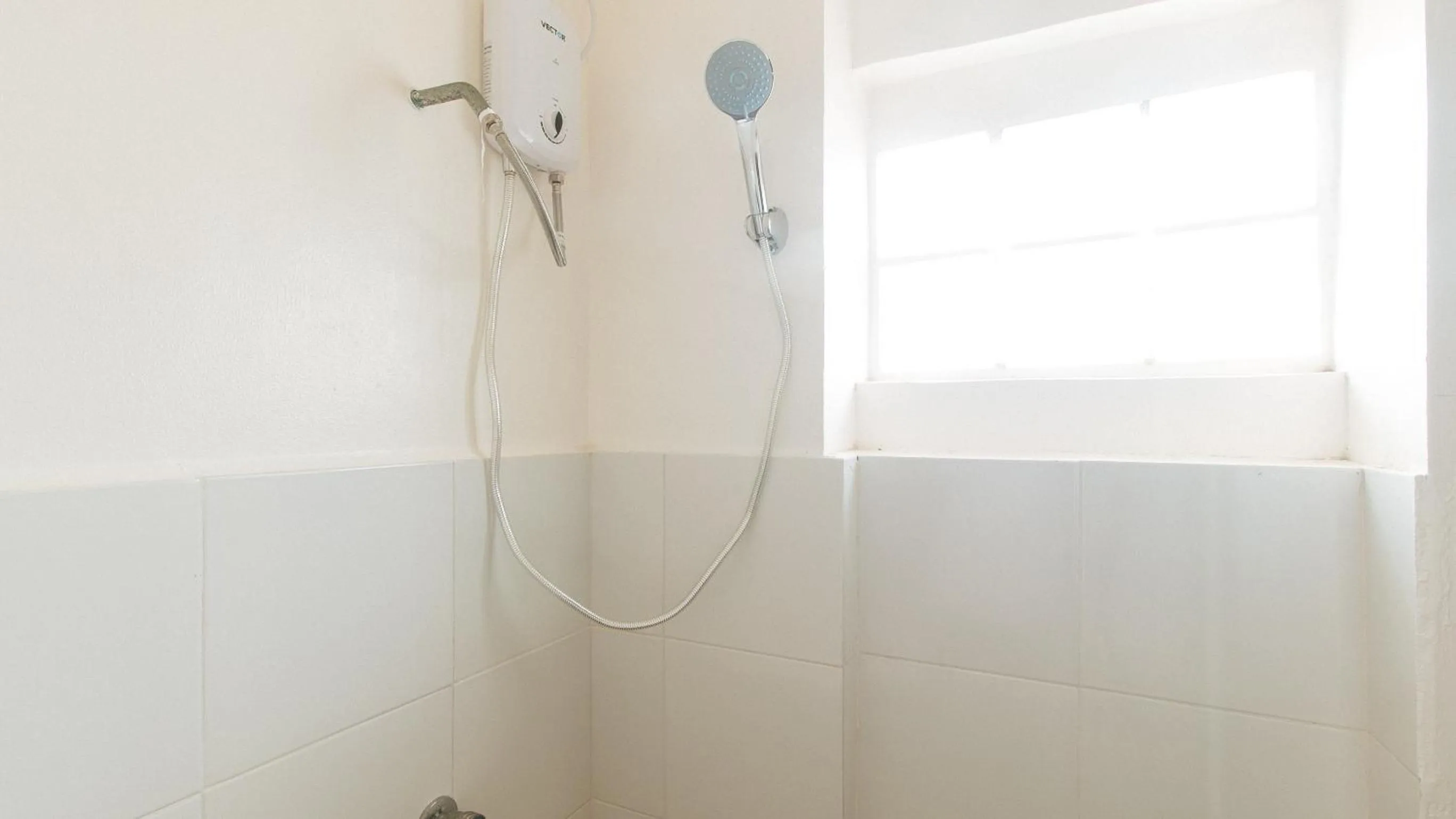 Shower in RedDoorz at Royal Grande Beach Resort Batangas