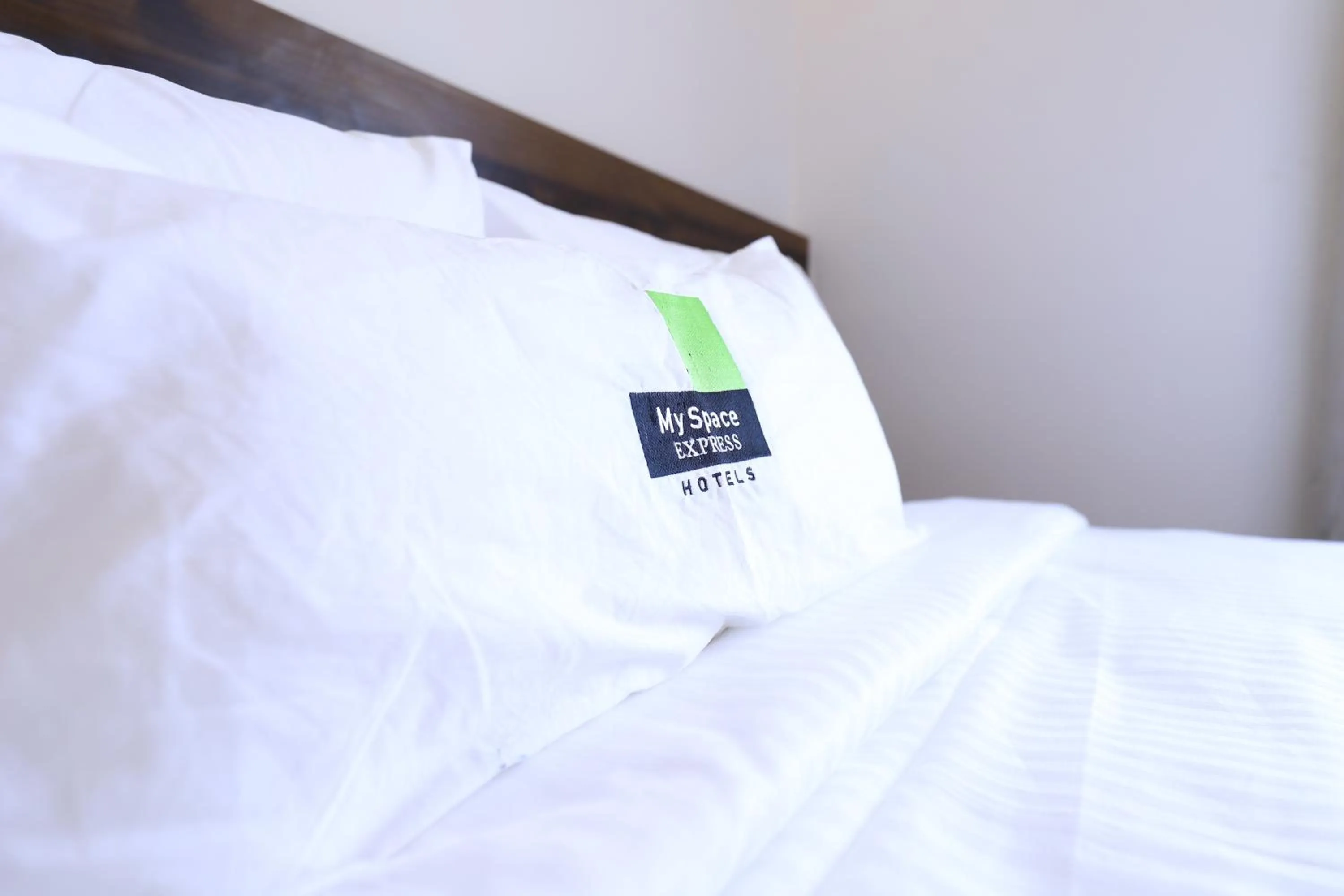 Bed in MySpace Express GD Inn