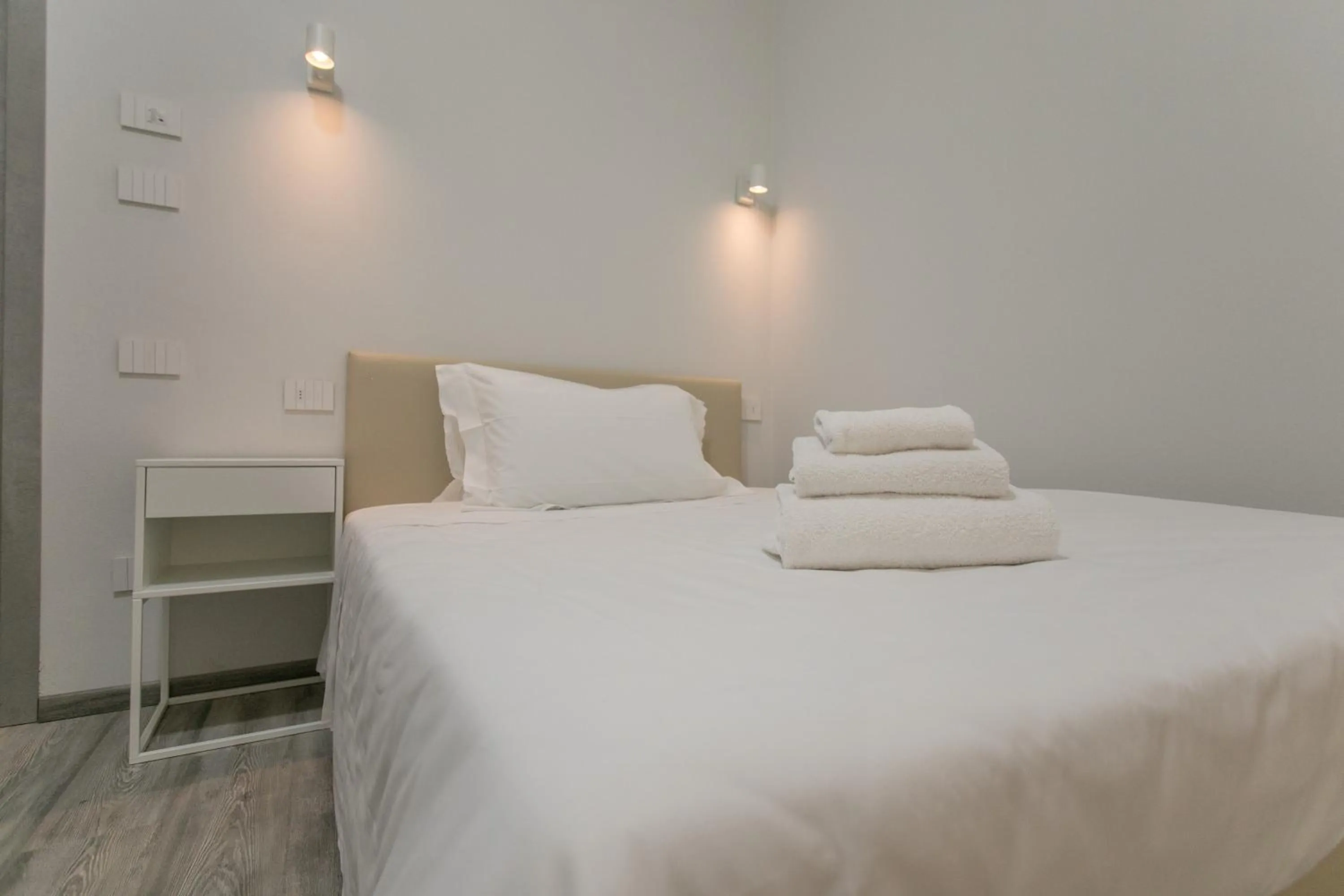 Bed in Hotel L'Aretino